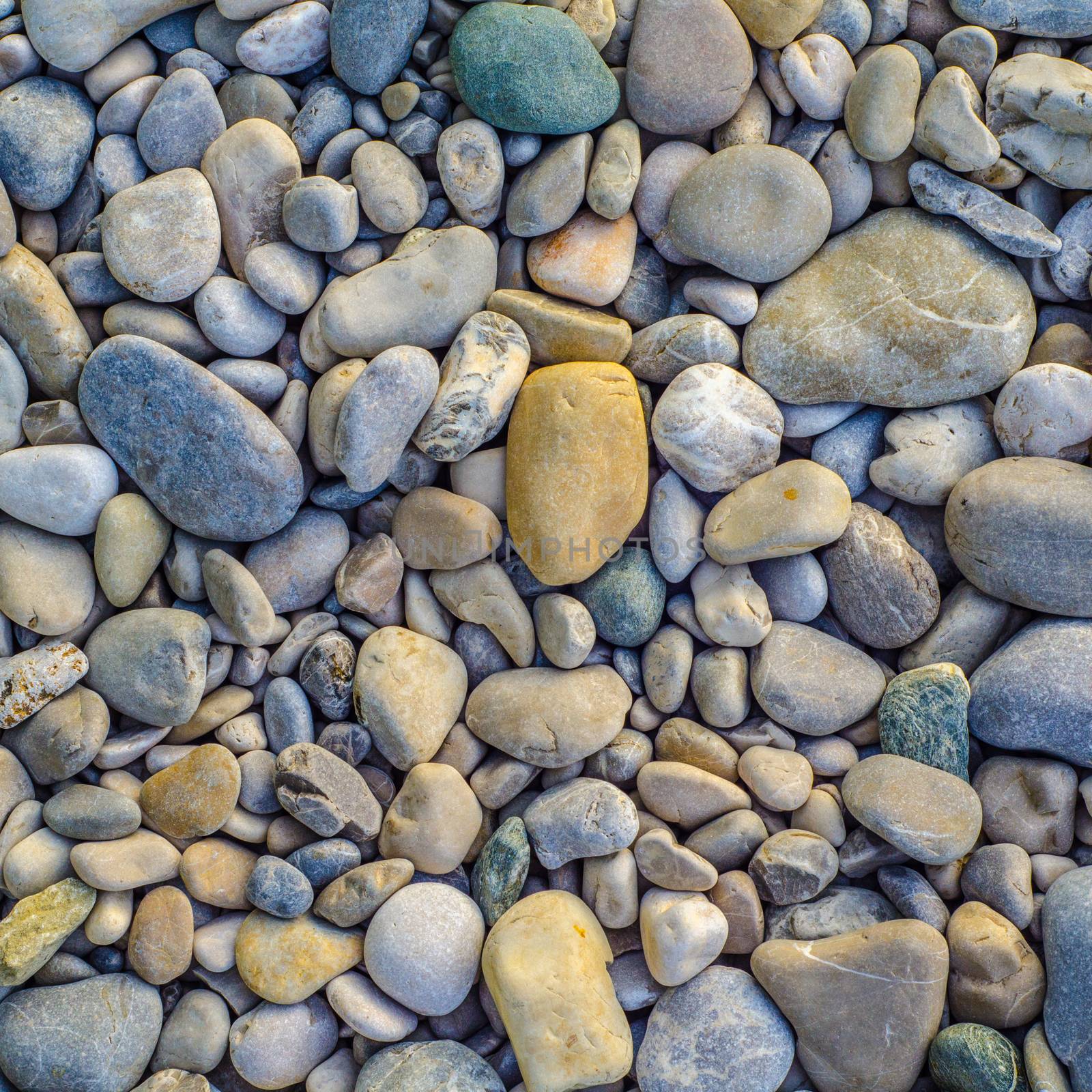 Background Texture Of Beautiful Smooth And Colorful River Stones