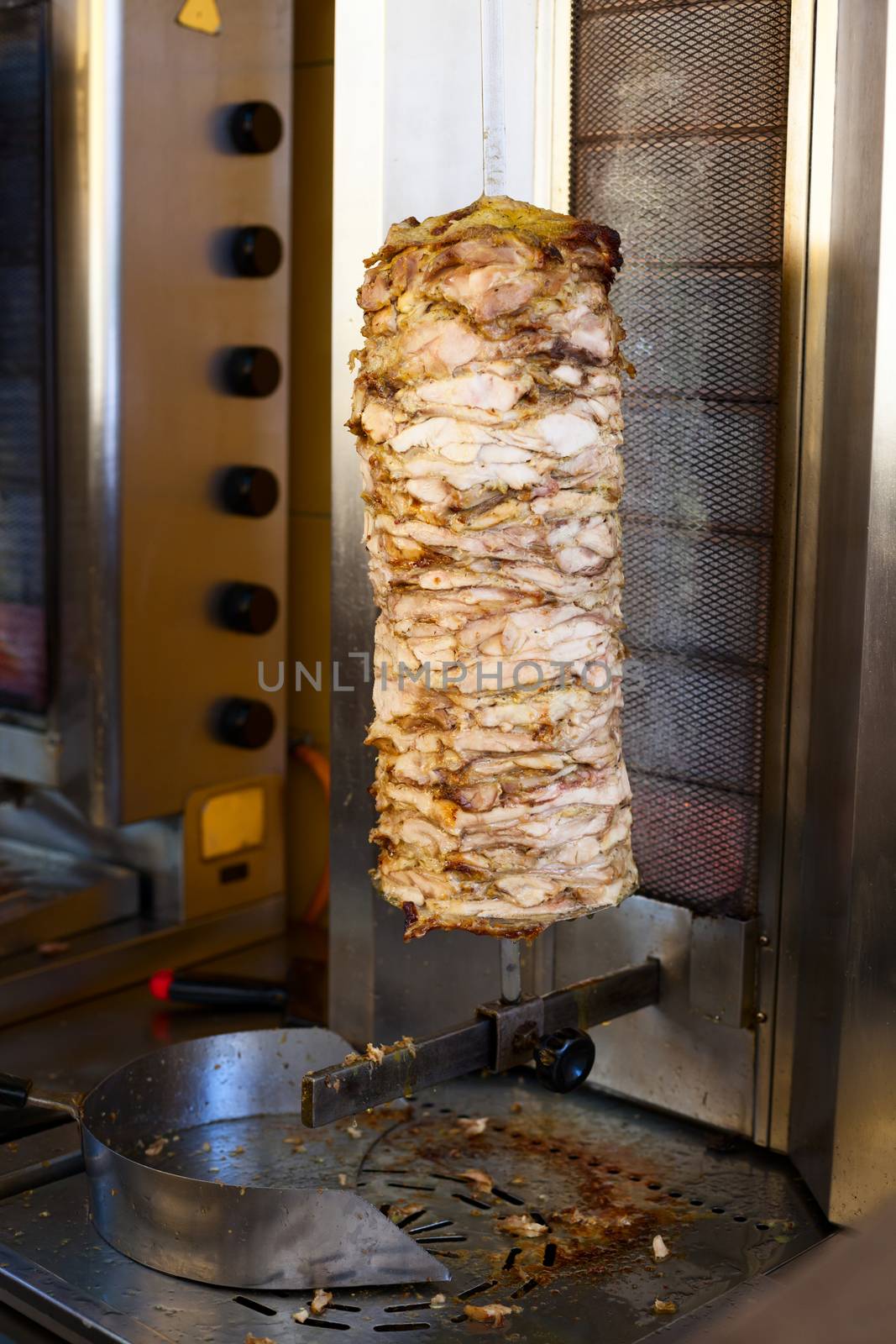 Gyro meat on rotating spit by naumoid