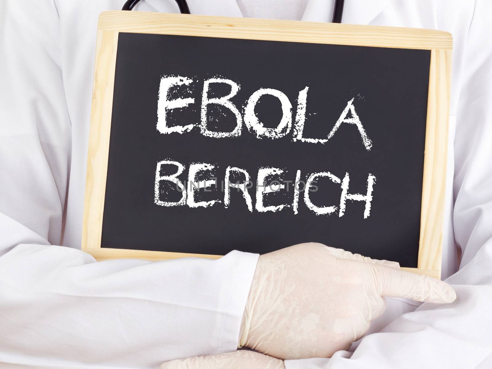 Doctor shows information: Ebola area in german language