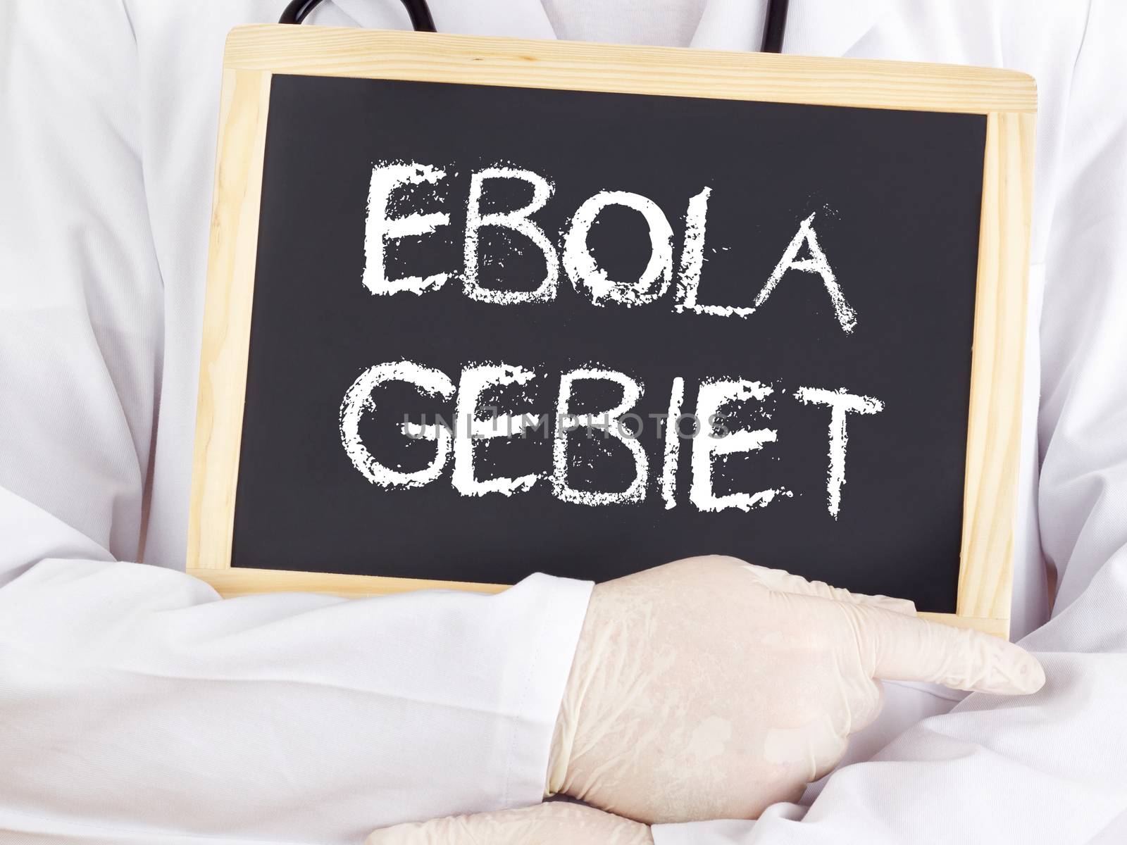 Doctor shows information: Ebola territory in german language by gwolters