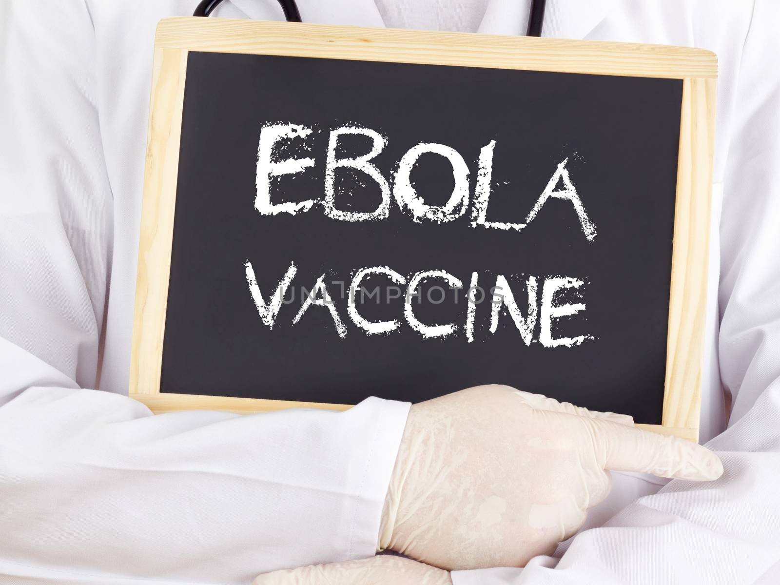 Doctor shows information: Ebola vaccine by gwolters