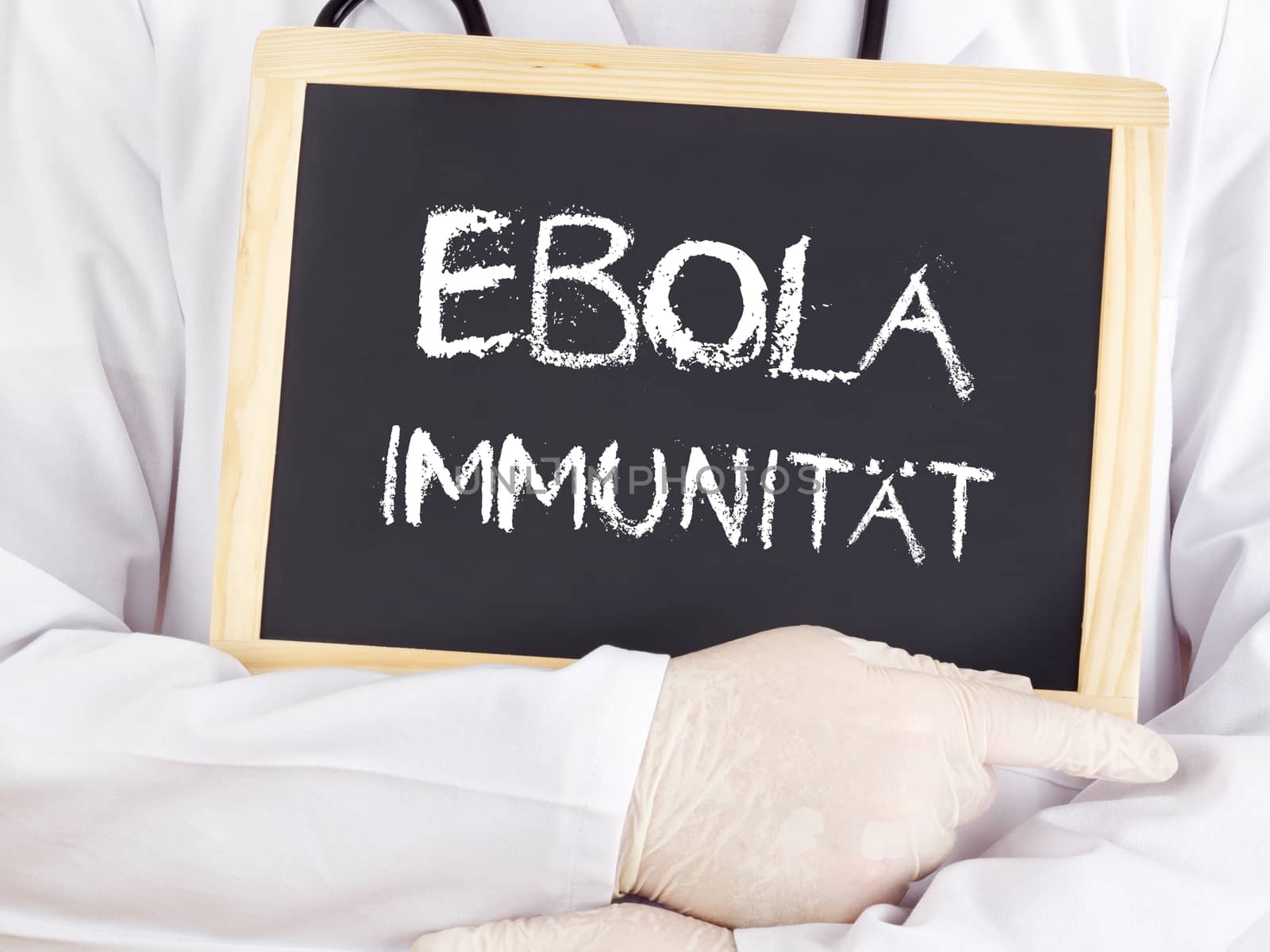 Doctor shows information: Ebola immunity in german language by gwolters