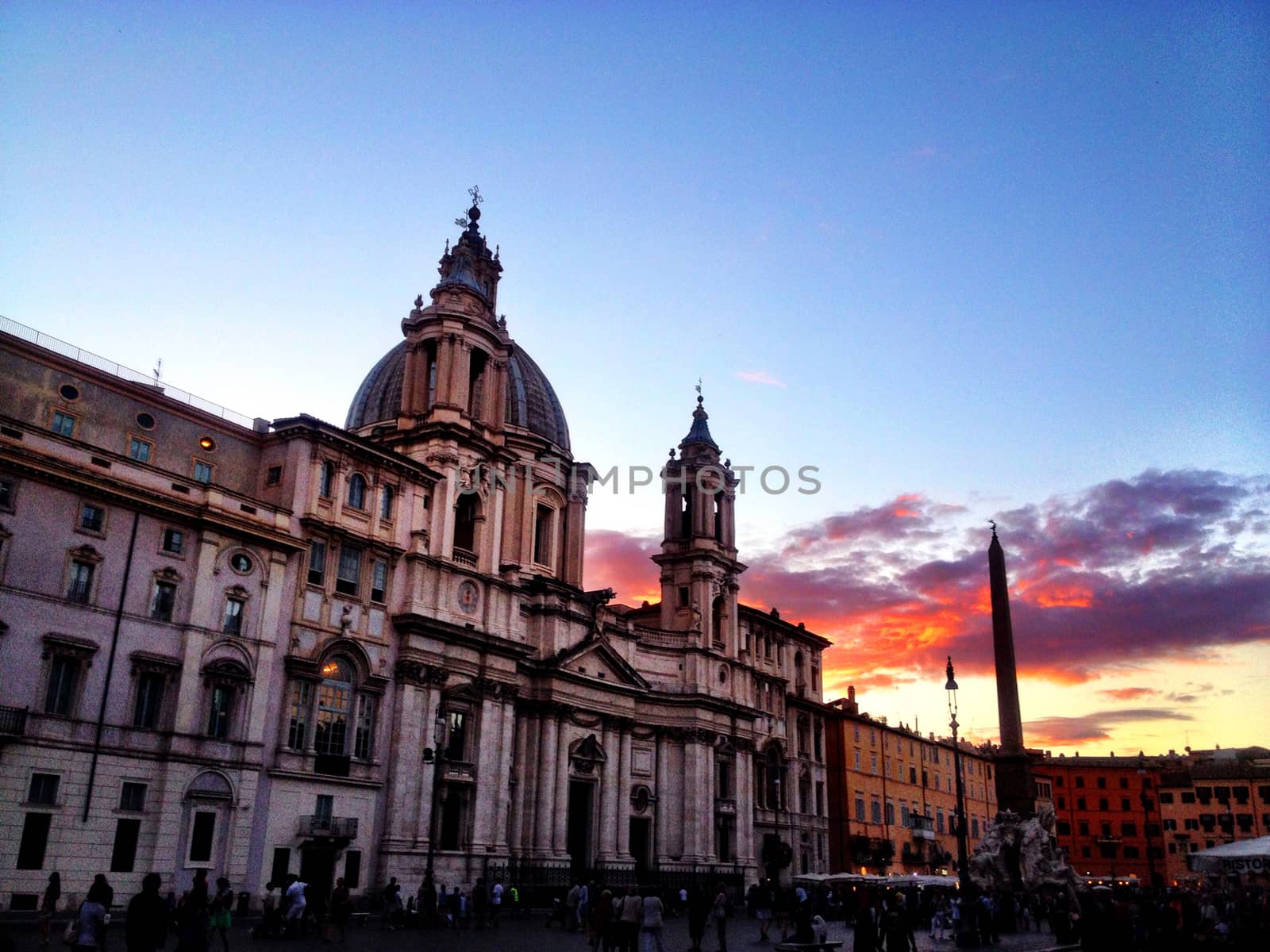 a warm sunset in a historical roman square