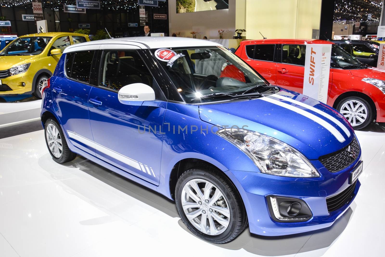 GENEVA, SWITZERLAND - MARCH 4: Suzuki Swift on display during the Geneva Motor Show, Geneva, Switzerland, March 4, 2014. 