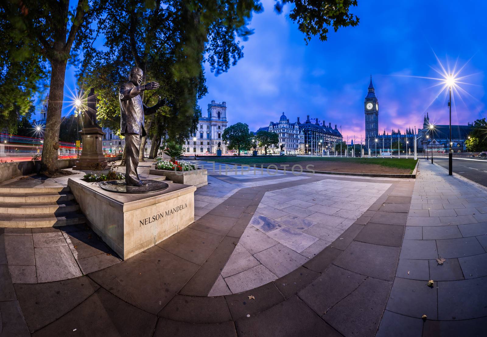 LONDON - OCTOBER 6: Panorama of Parliament Square and Nelson Mandela memorial by sculptor Glyn Williams on October 6, 2014 in London, United Kingdom.