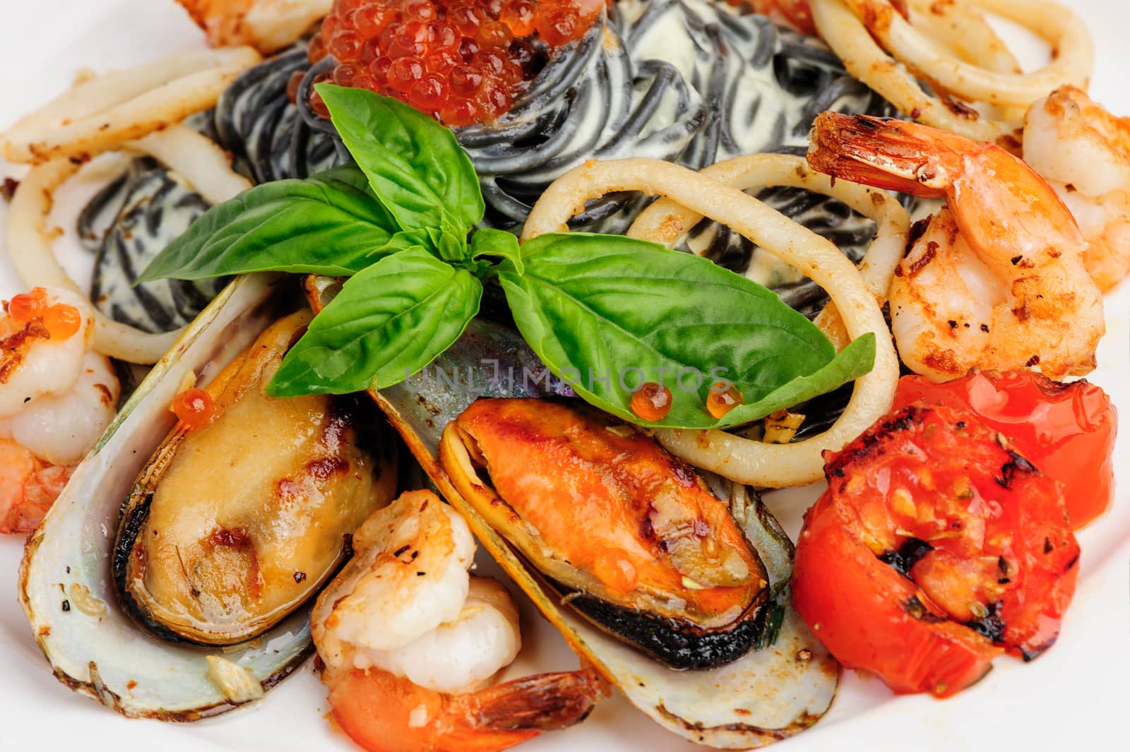 Black Pasta with Calamari Rings, Mussels, Shrimps and Basil