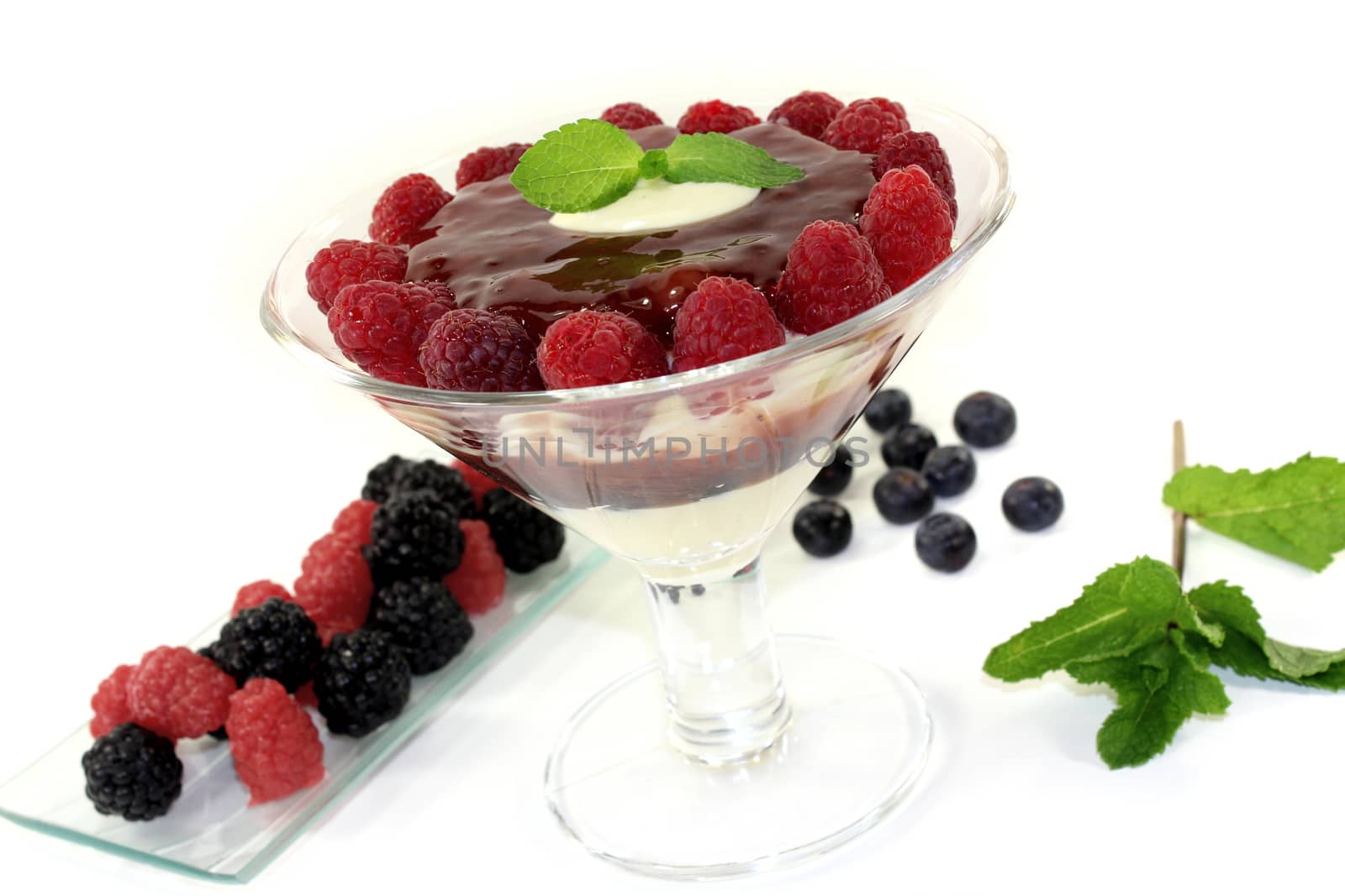 Layered dessert with peppermint on a bright background