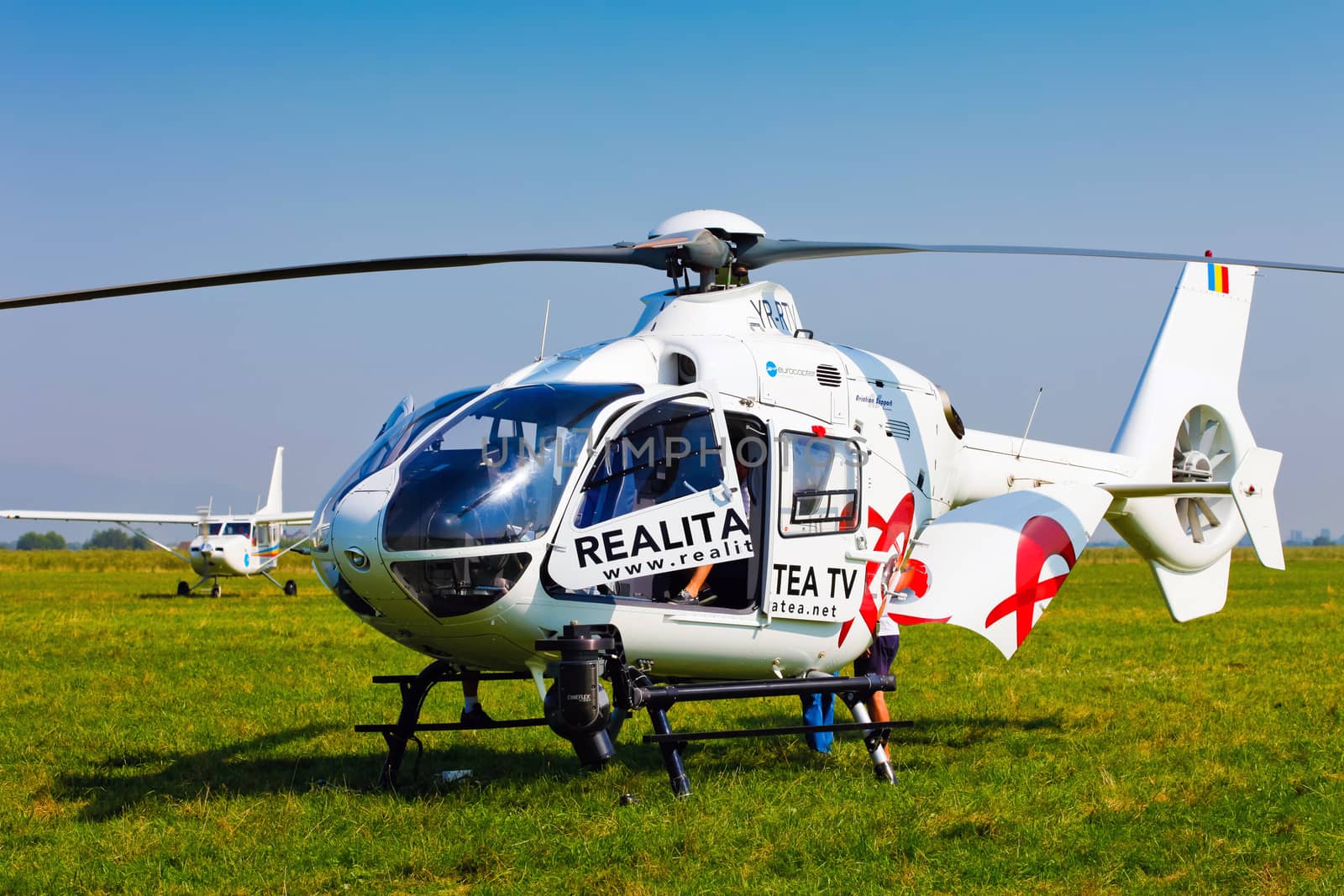 Brasov, Romania - August 12, 2010: TV news helicopter on a blue sky