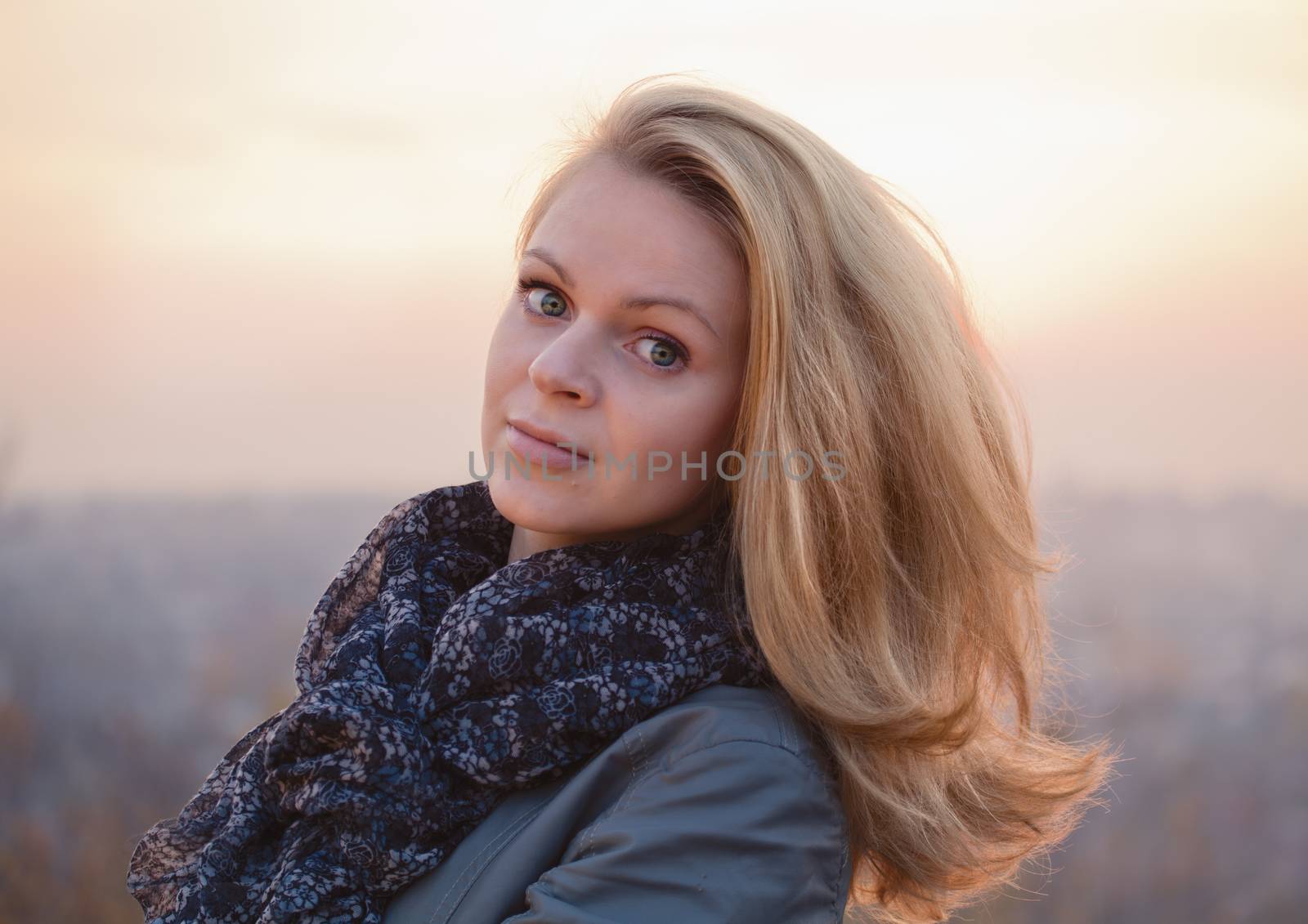 Young girl blonde on simple background by fotooxotnik