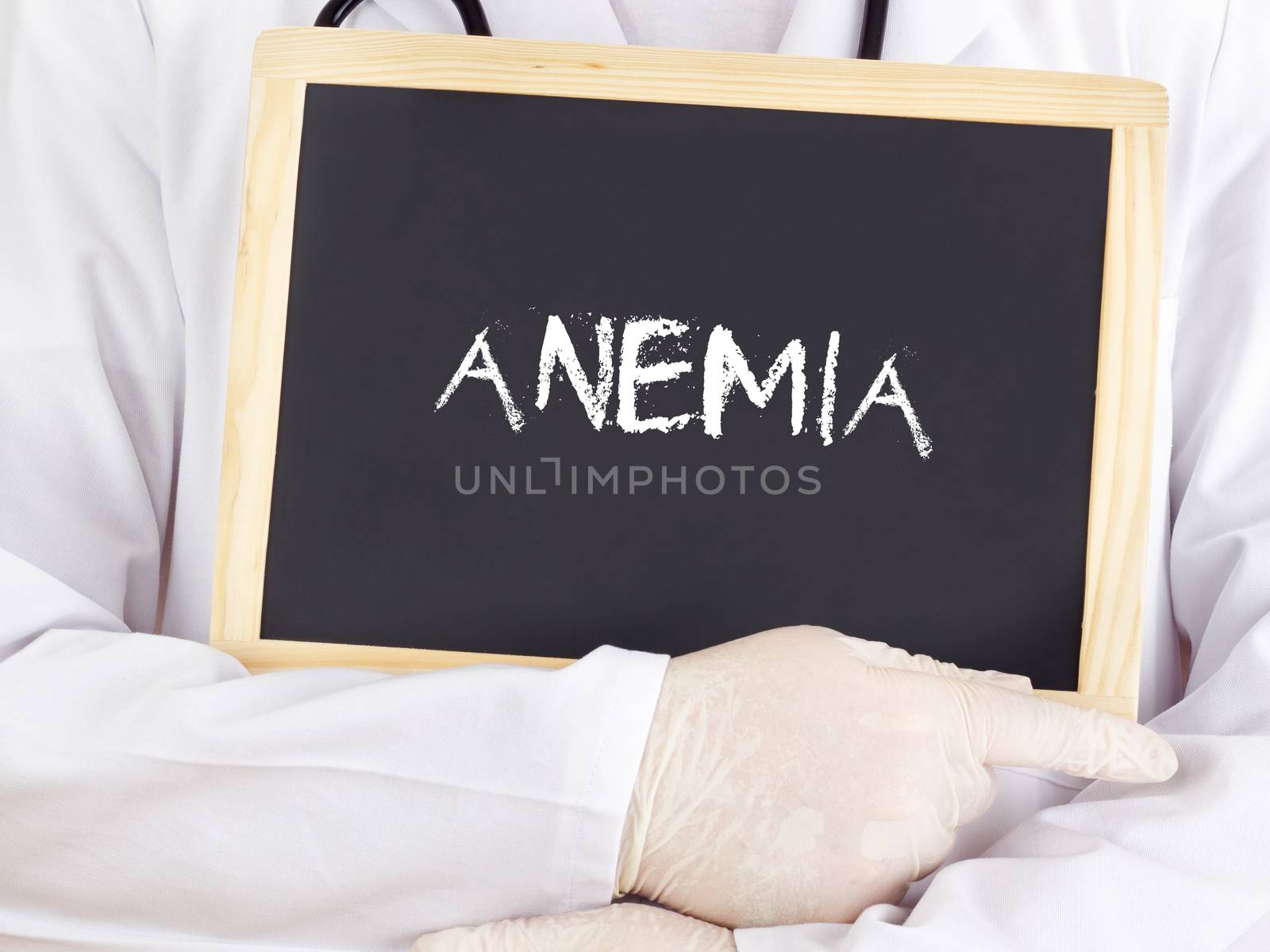 Doctor shows information on blackboard: anemia