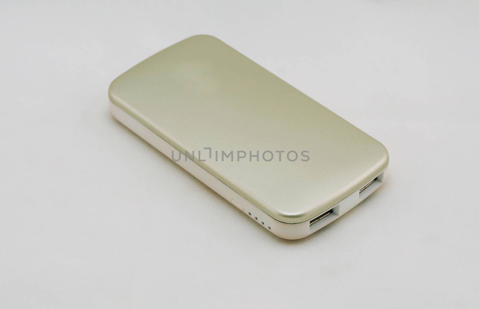 Gold optional external battery for an energy boost placed on a white background.                               