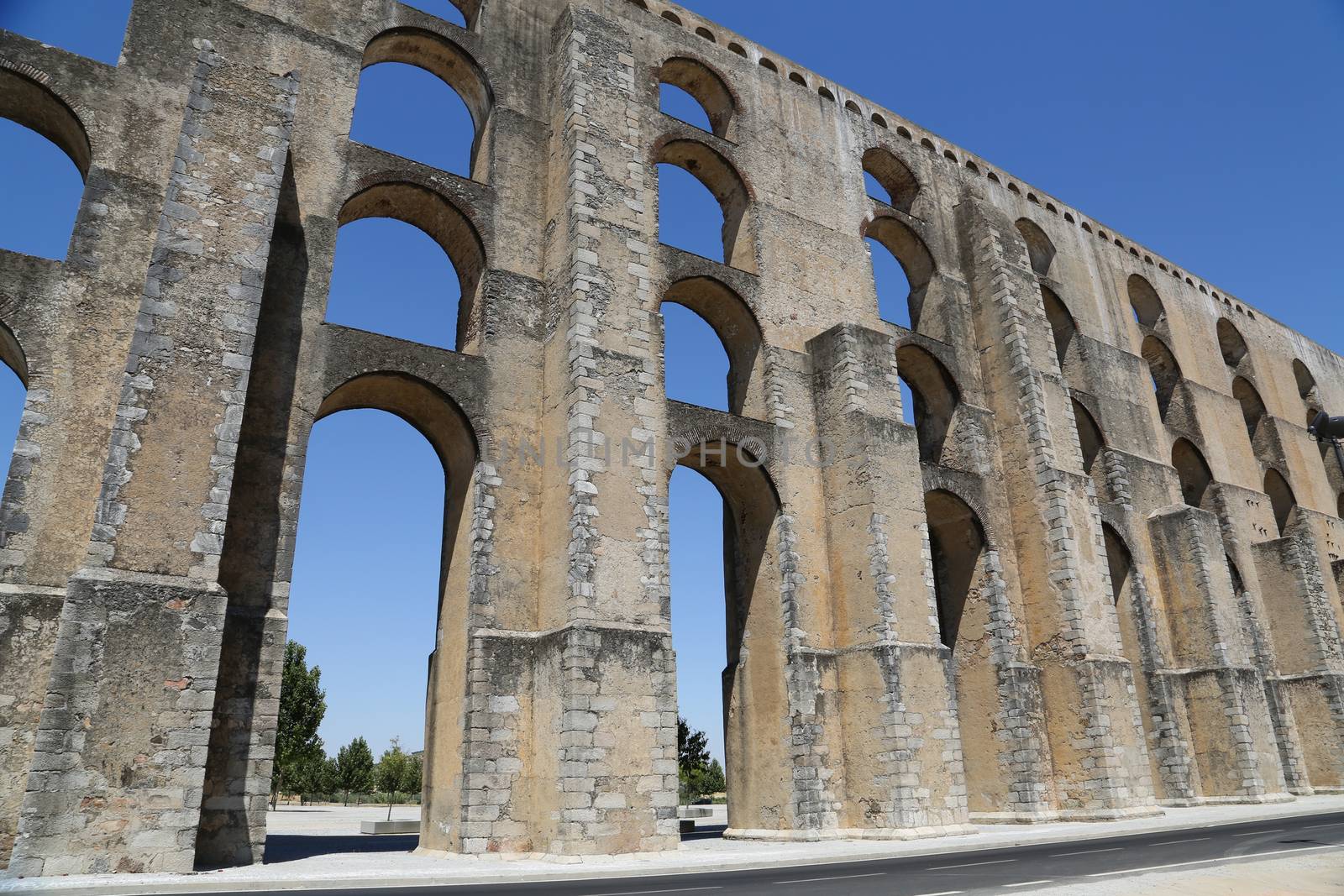 The arches of the Roman Aqueduct Aqueduto da Amoreira in Elvas in Portugal