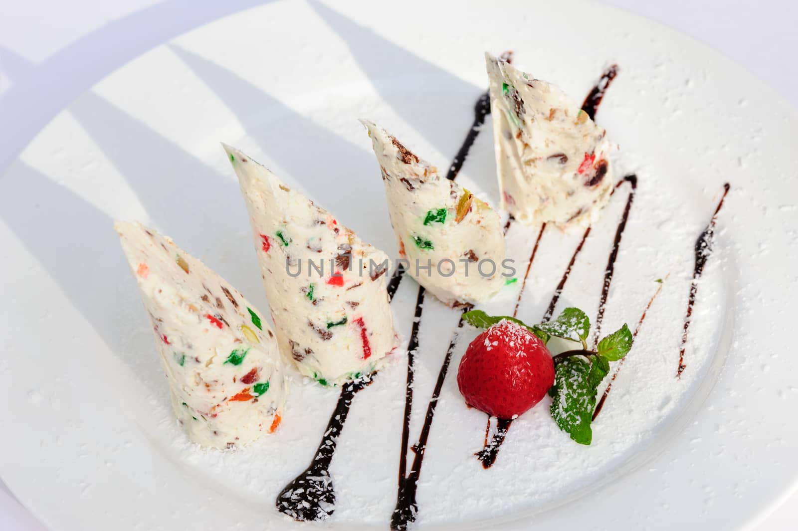Italian dessert semifreddo with succades and strawberry