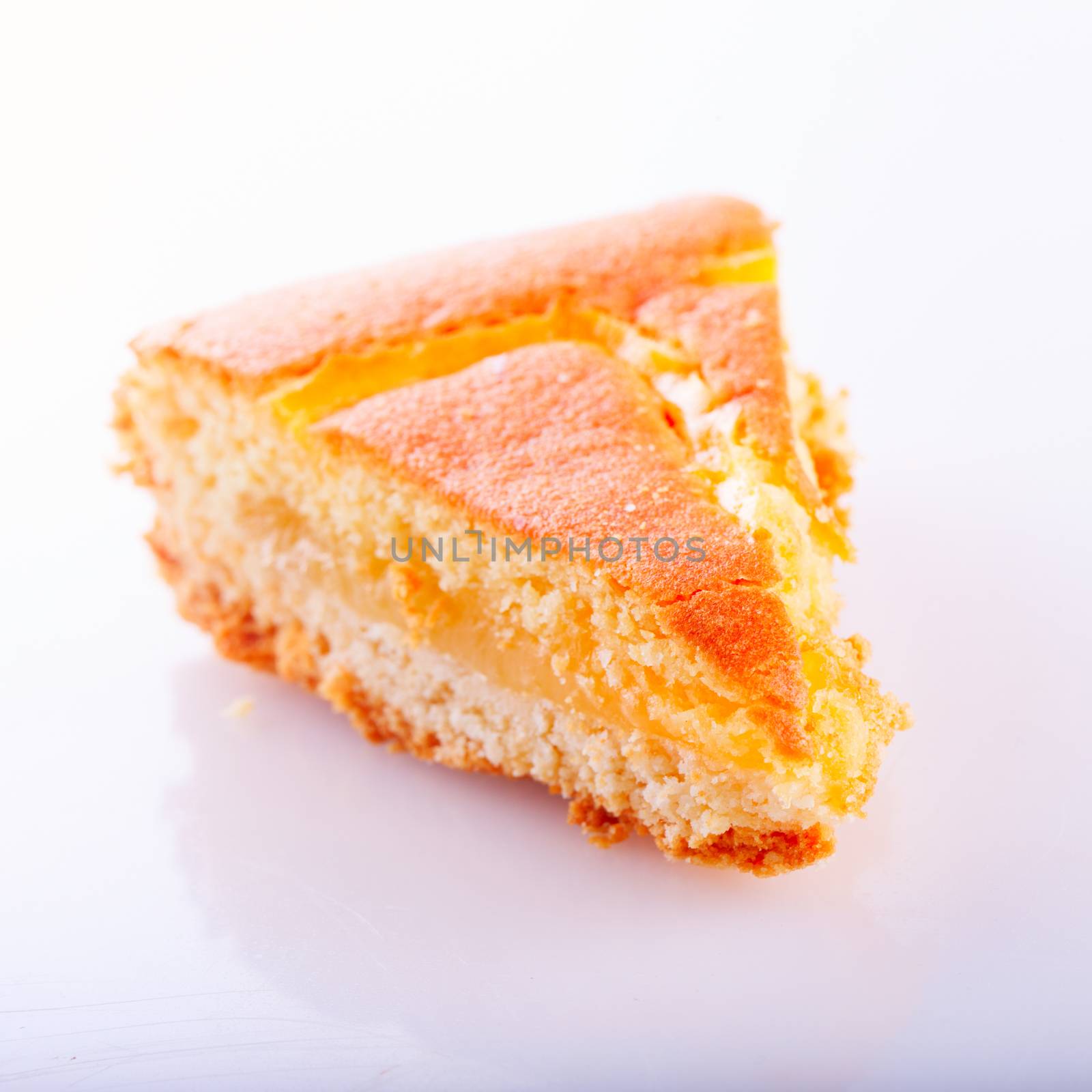 Lemon cake over white background, square image