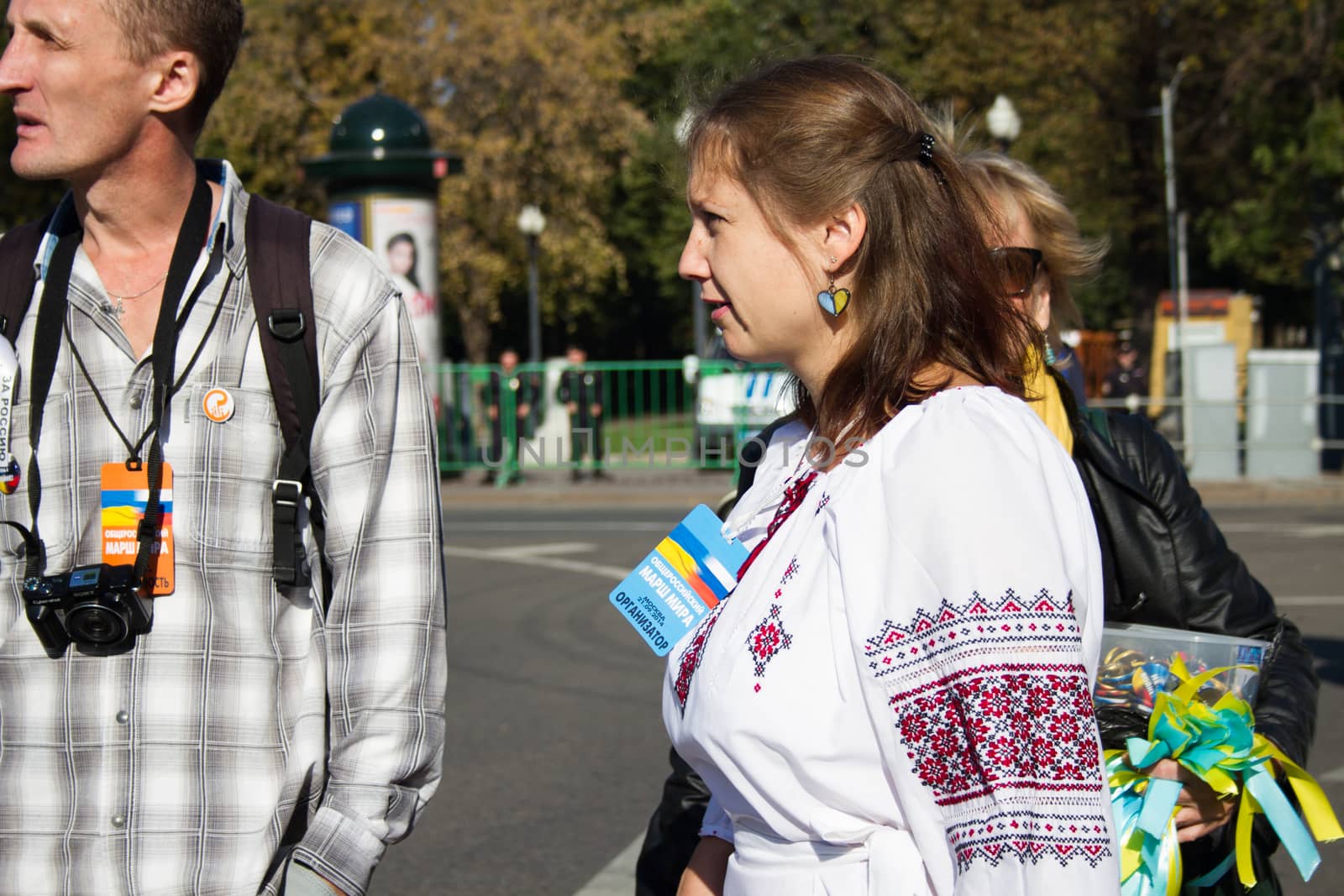 Moscow, Russia - September 21, 2014.  Peace March the girl in the Ukrainian national clothes Peace March in Moscow against war with Ukraine