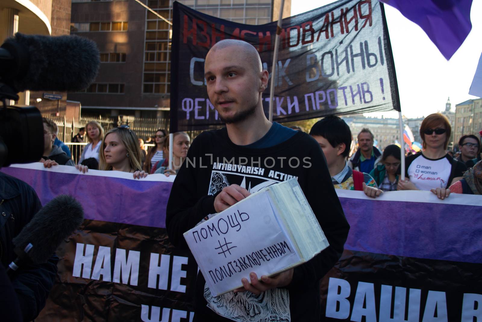 Moscow, Russia - September 21, 2014. Former political prisoner Vladimir Akimenkov Peace March against war with Ukraine