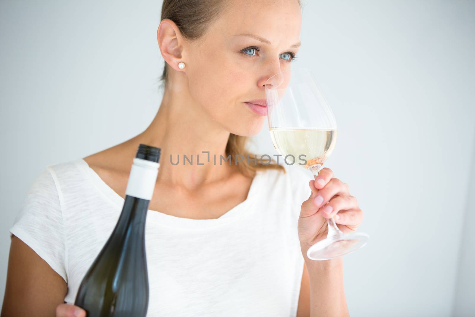 Gorgeous young woman with a glass of wine by viktor_cap