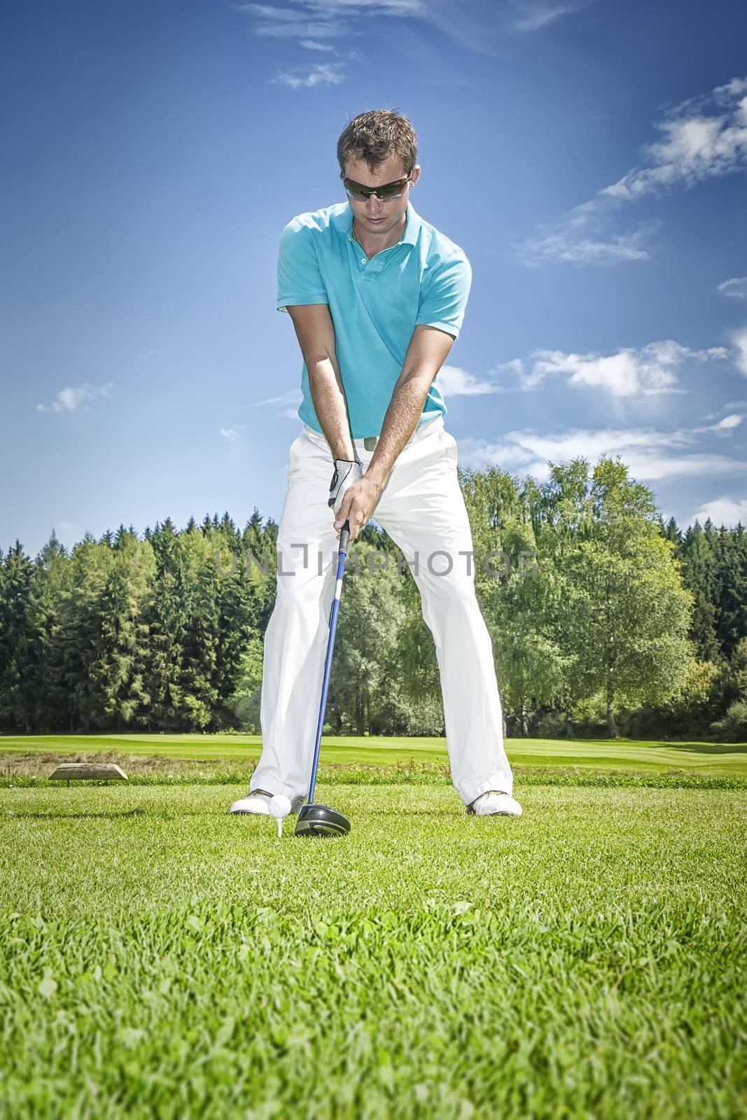 An image of a young male golf player