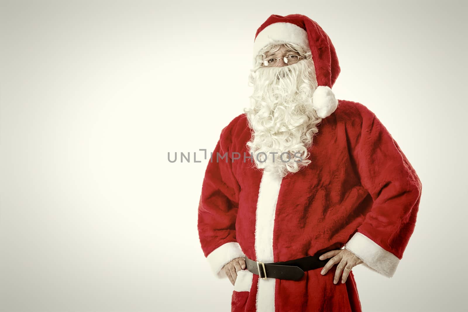 A handsome Santa Claus isolated on a white background