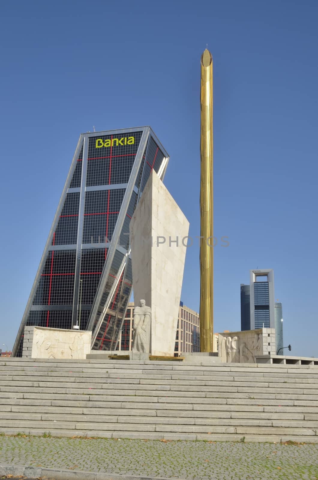 Memorial monument to Clavo Sotelo, a Spanish political in a Square next to one of KIO Towers, Madrid, Spain. KIO Towers were designed by the American architects Philip Johnson and John Burgee.
