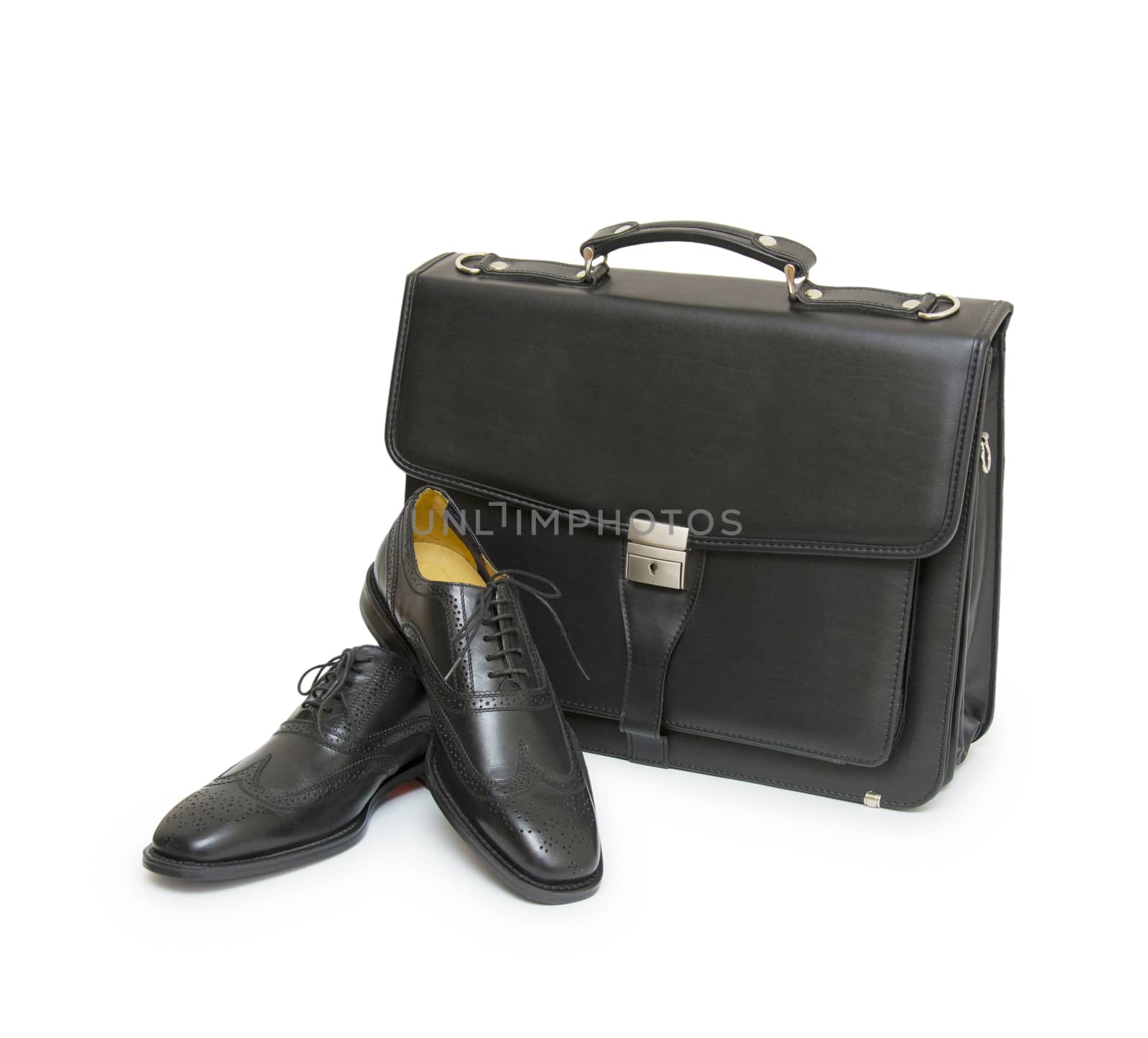 Shoes and bag on white background