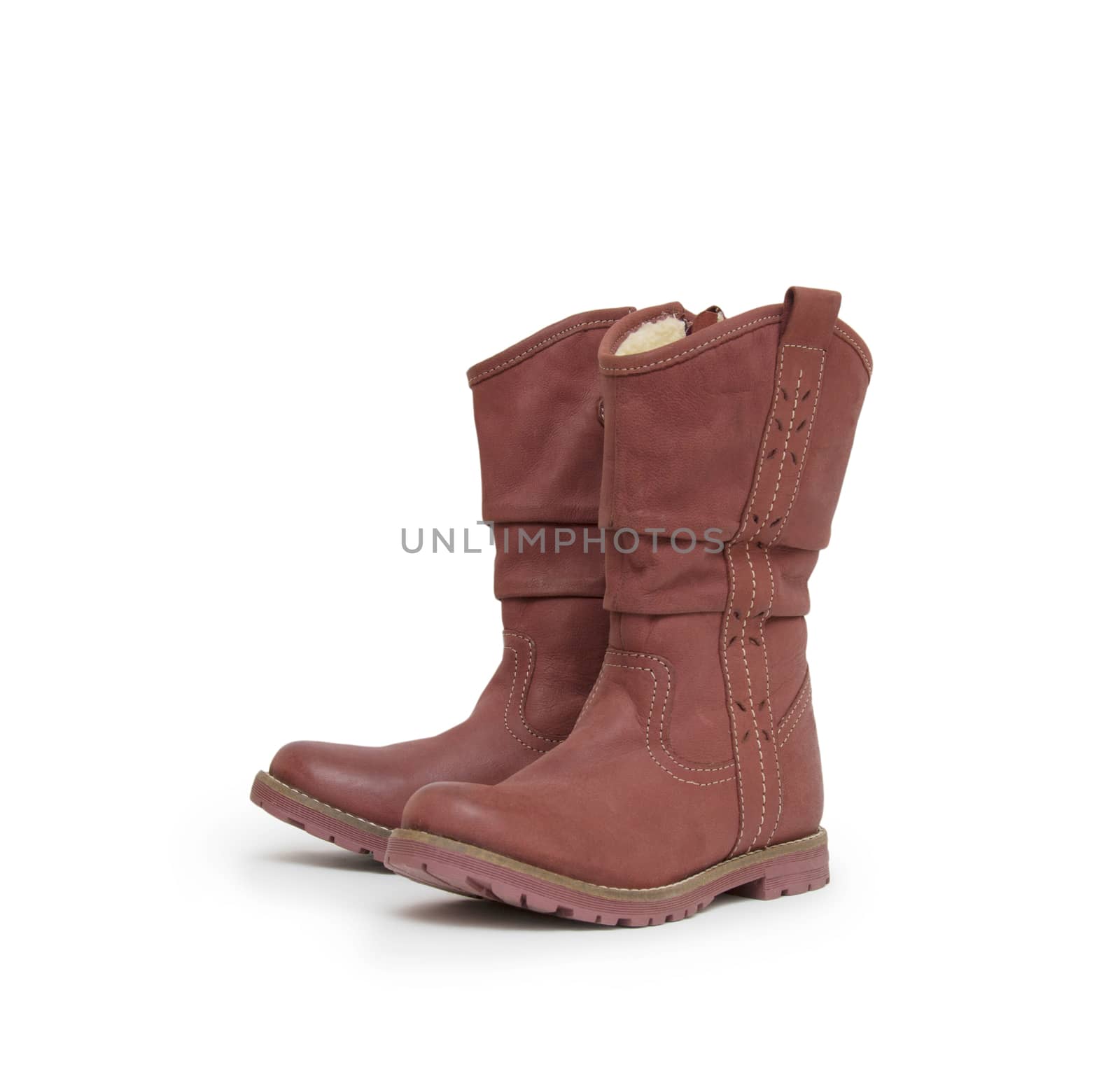 pair of boots isolated on a white background.