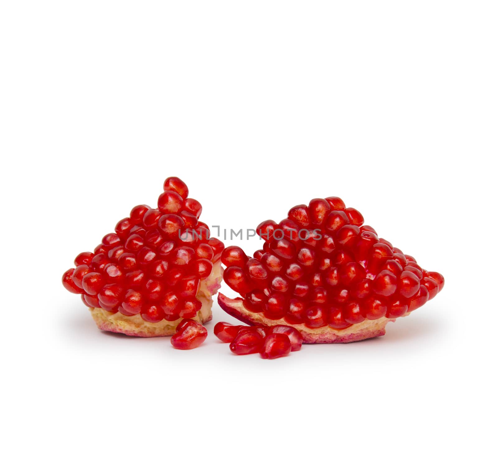 Ripe pomegranate fruit isolated on white background cutout by cocoo