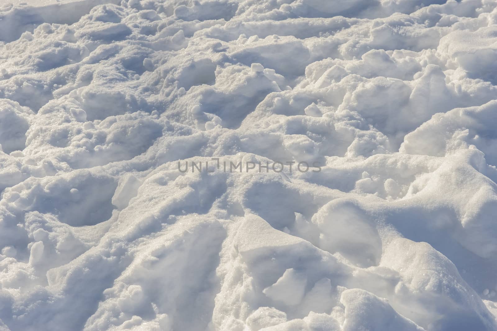 chaotic human tracks on the fresh white snow