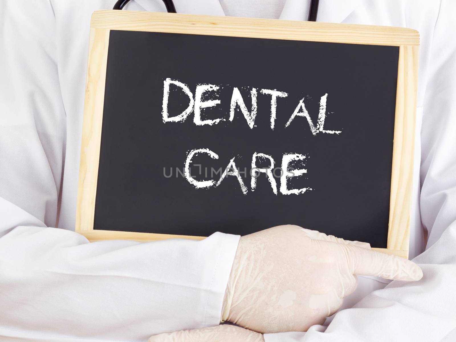 Doctor shows information: dental care