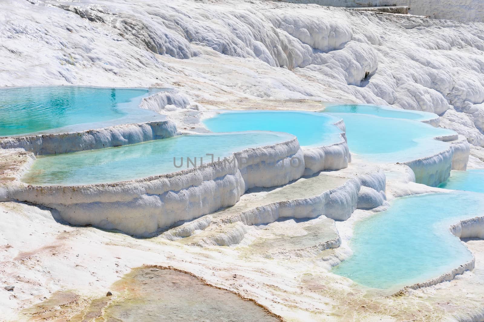Travertine pools and terraces in Pamukkale, Turkey by starush