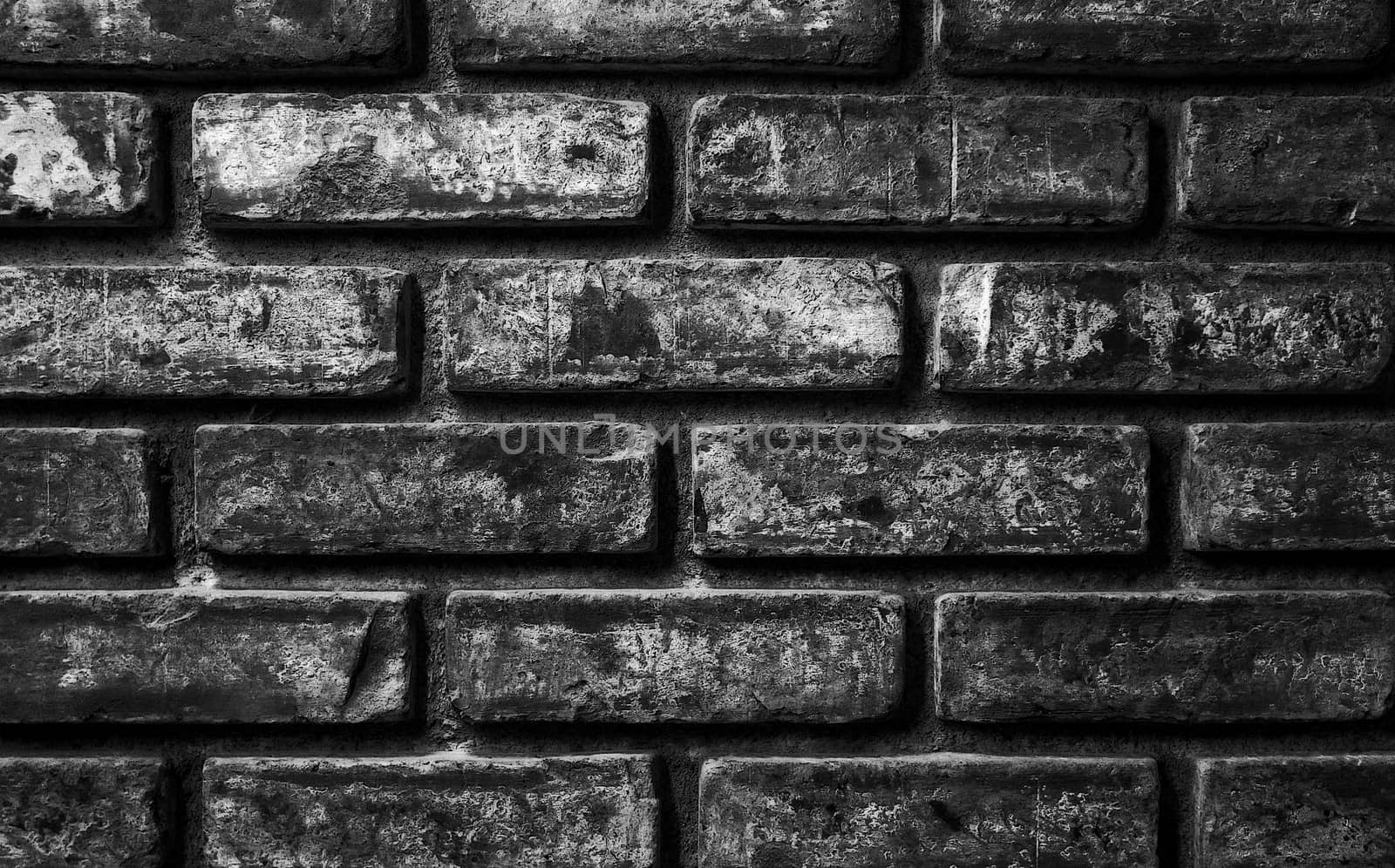 Old brick wall texture in black and white.