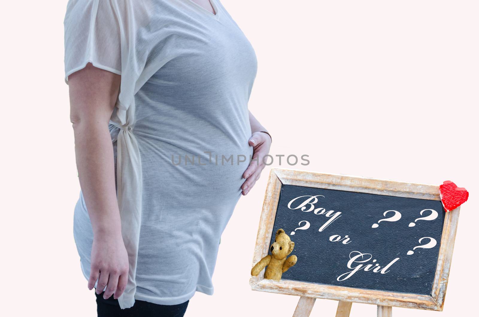 Upper body of a pregnant woman against a white background