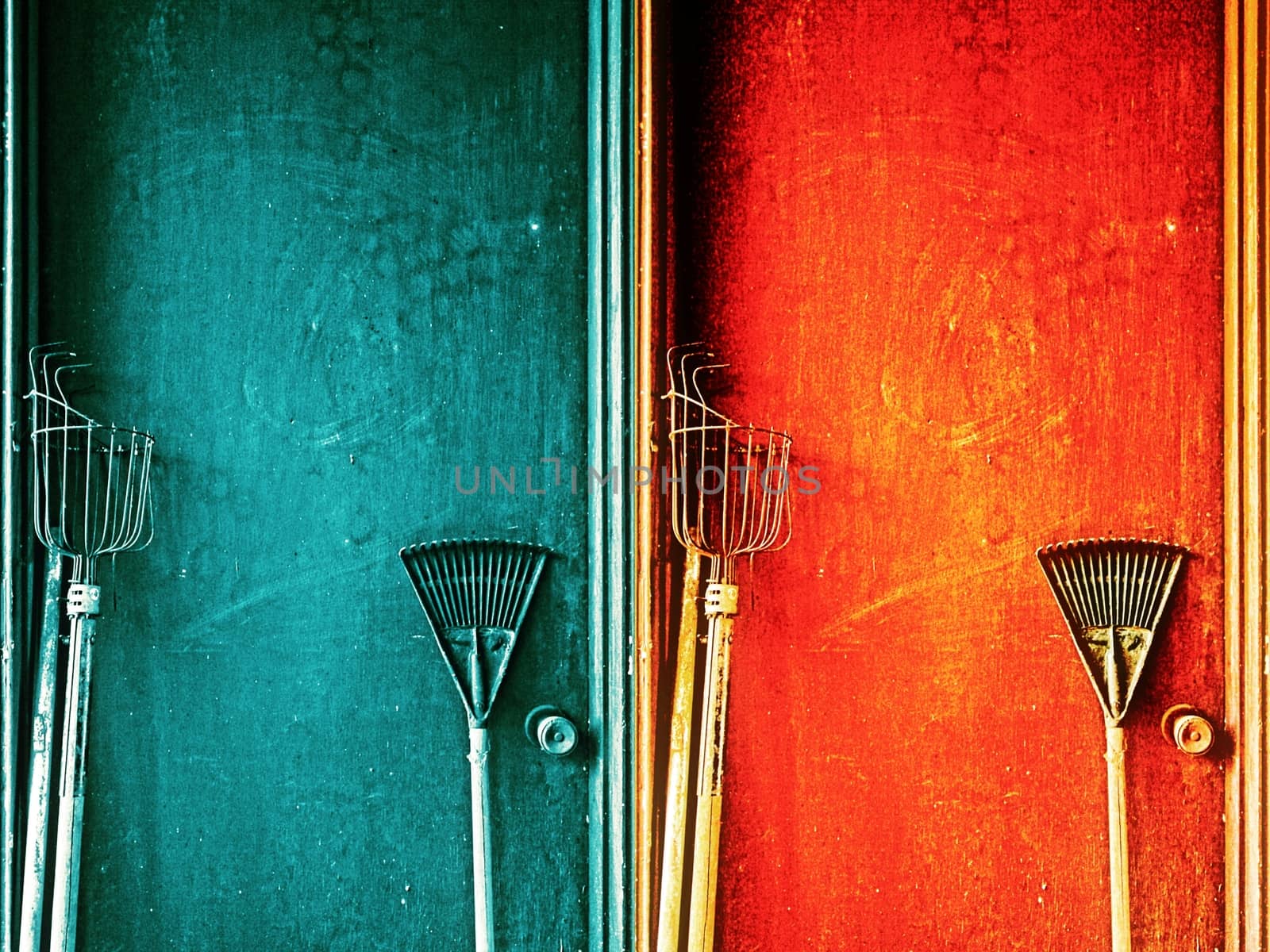 Gardening tools with colorful doors background.