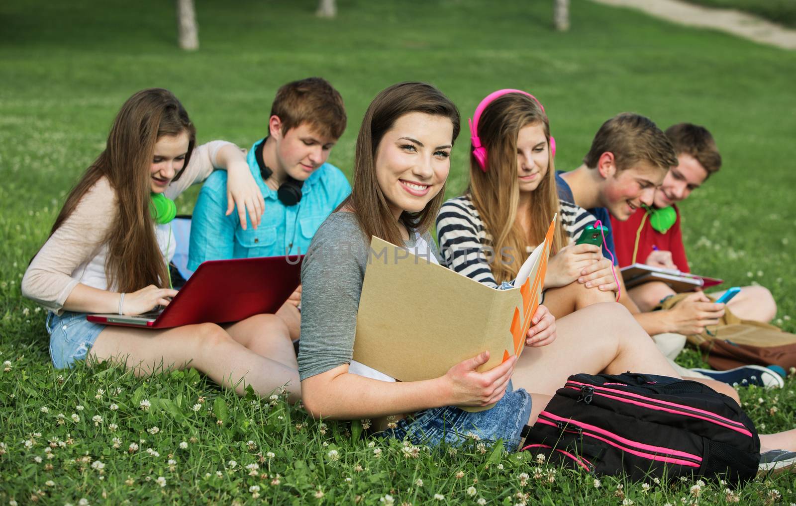 Smiling Student with Friends by Creatista