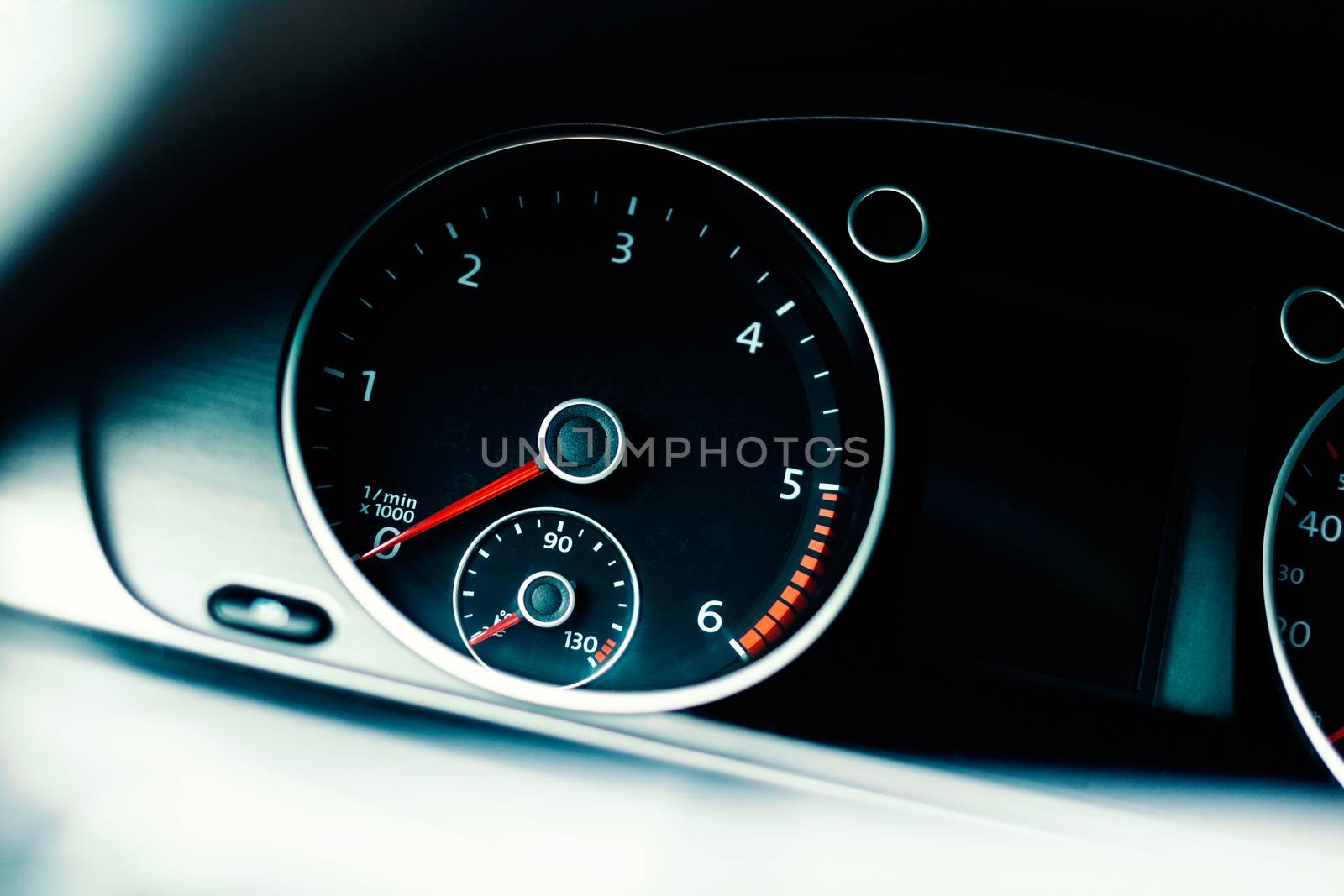 Detail of a tachometer in a car by uros93