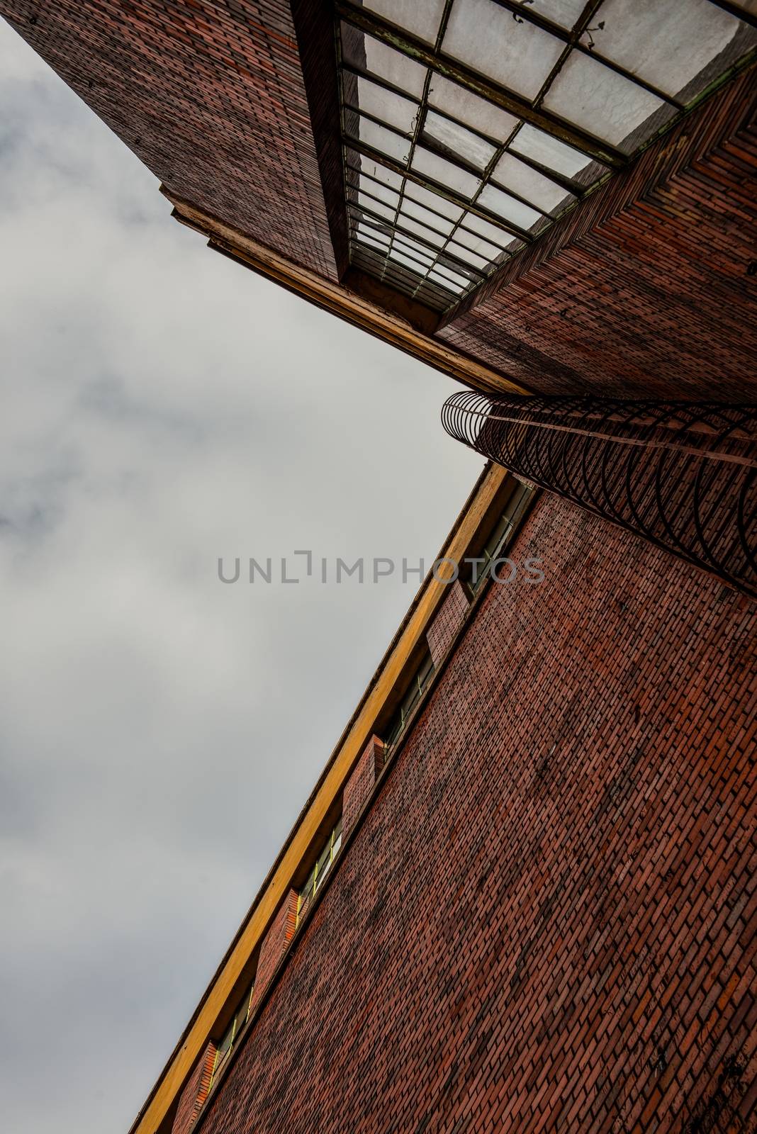 Large industrial building angle shot with sky