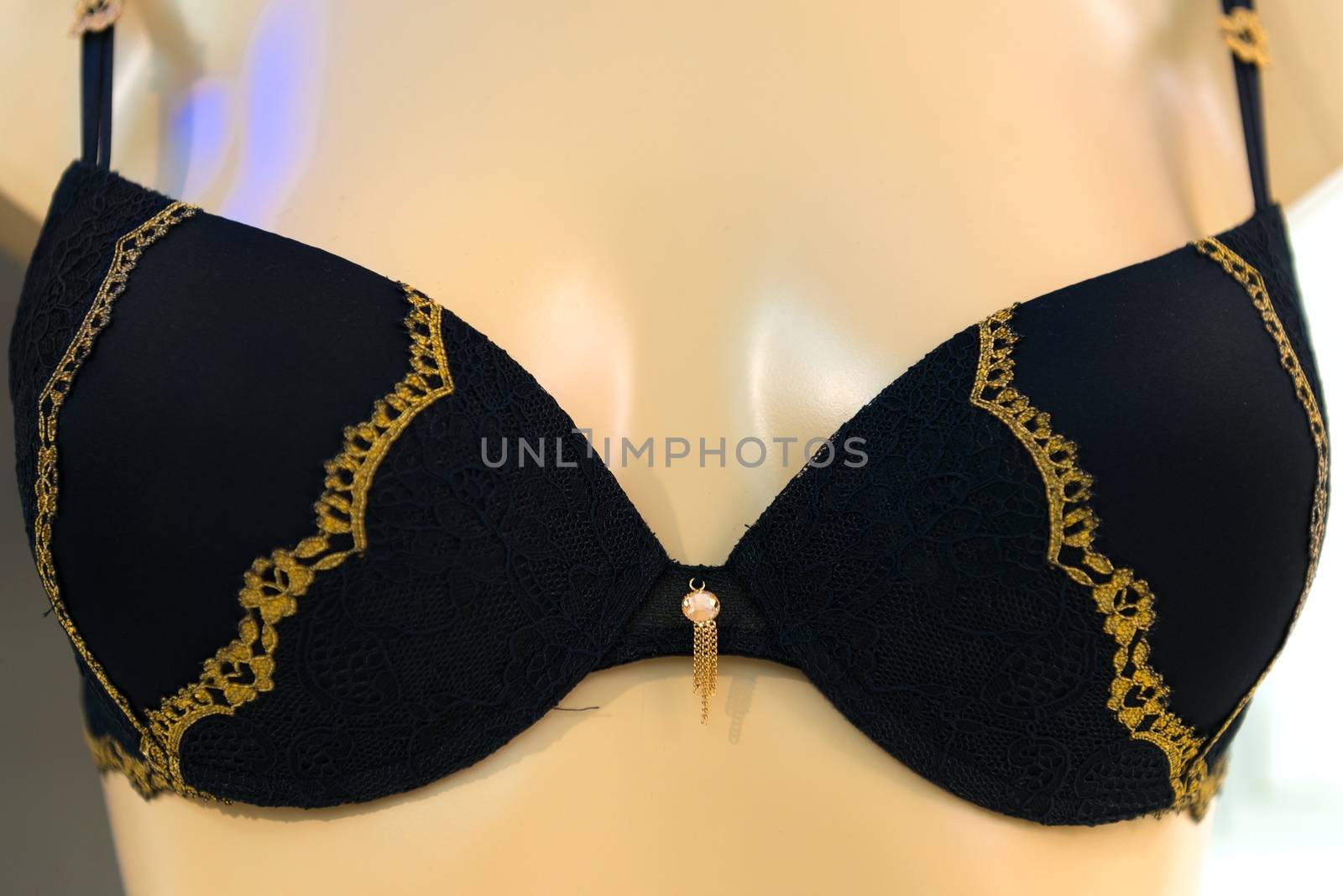 Black bra with decoration close up photo