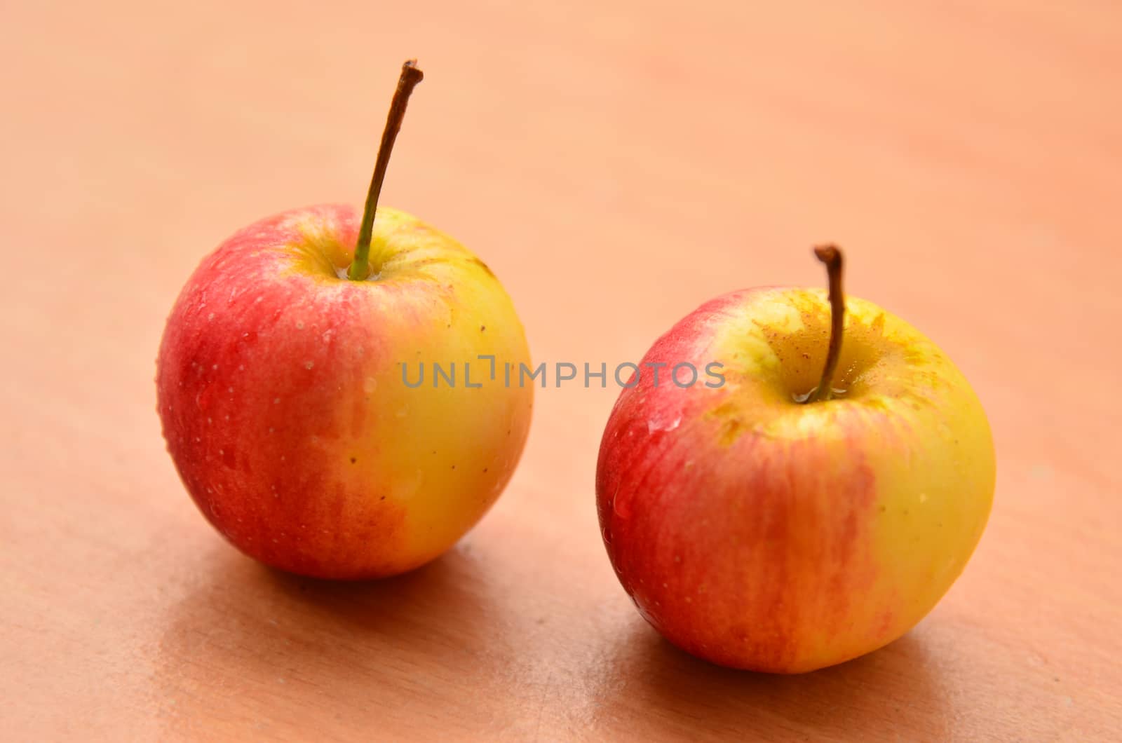 Fresh apples on table