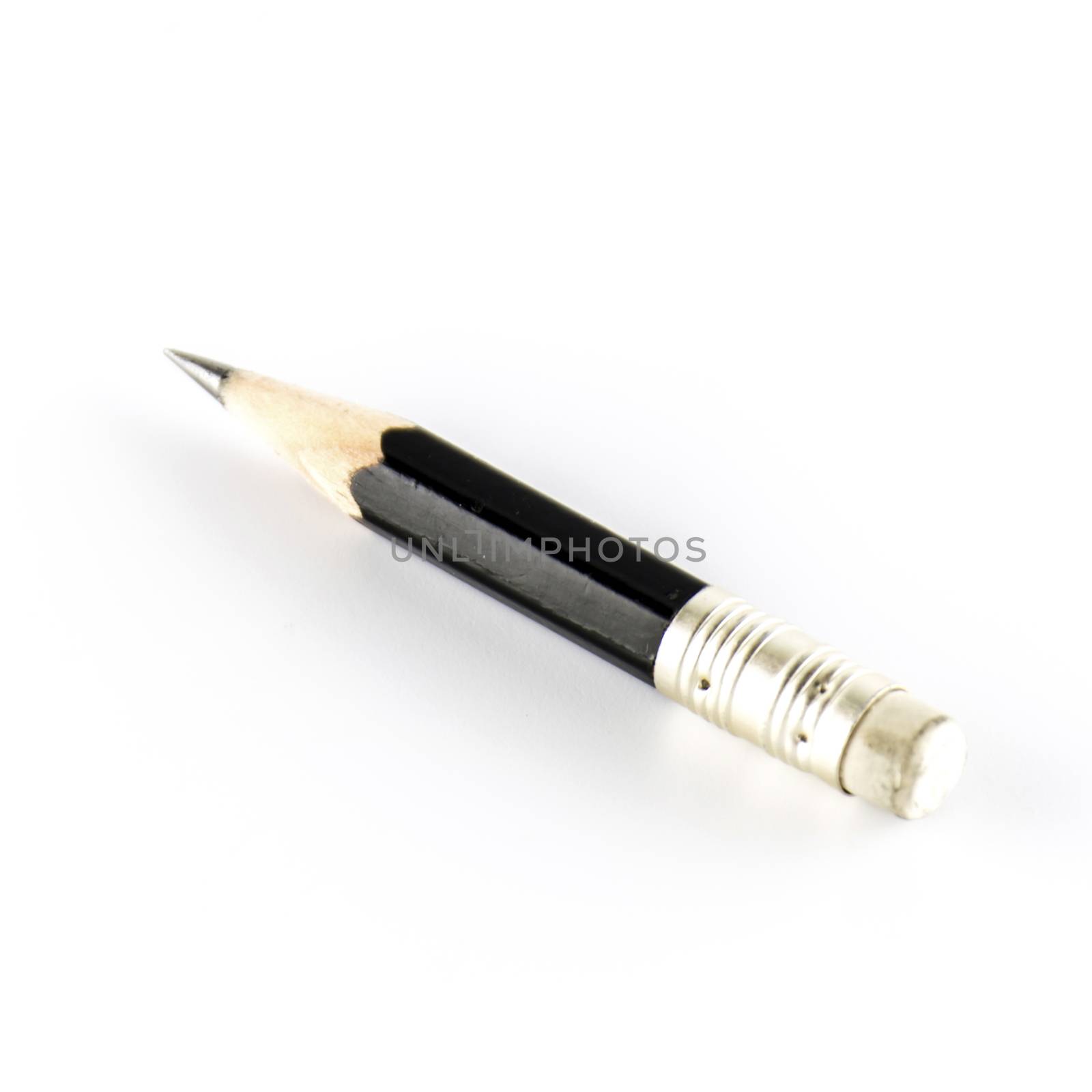 short black pencil on a white background