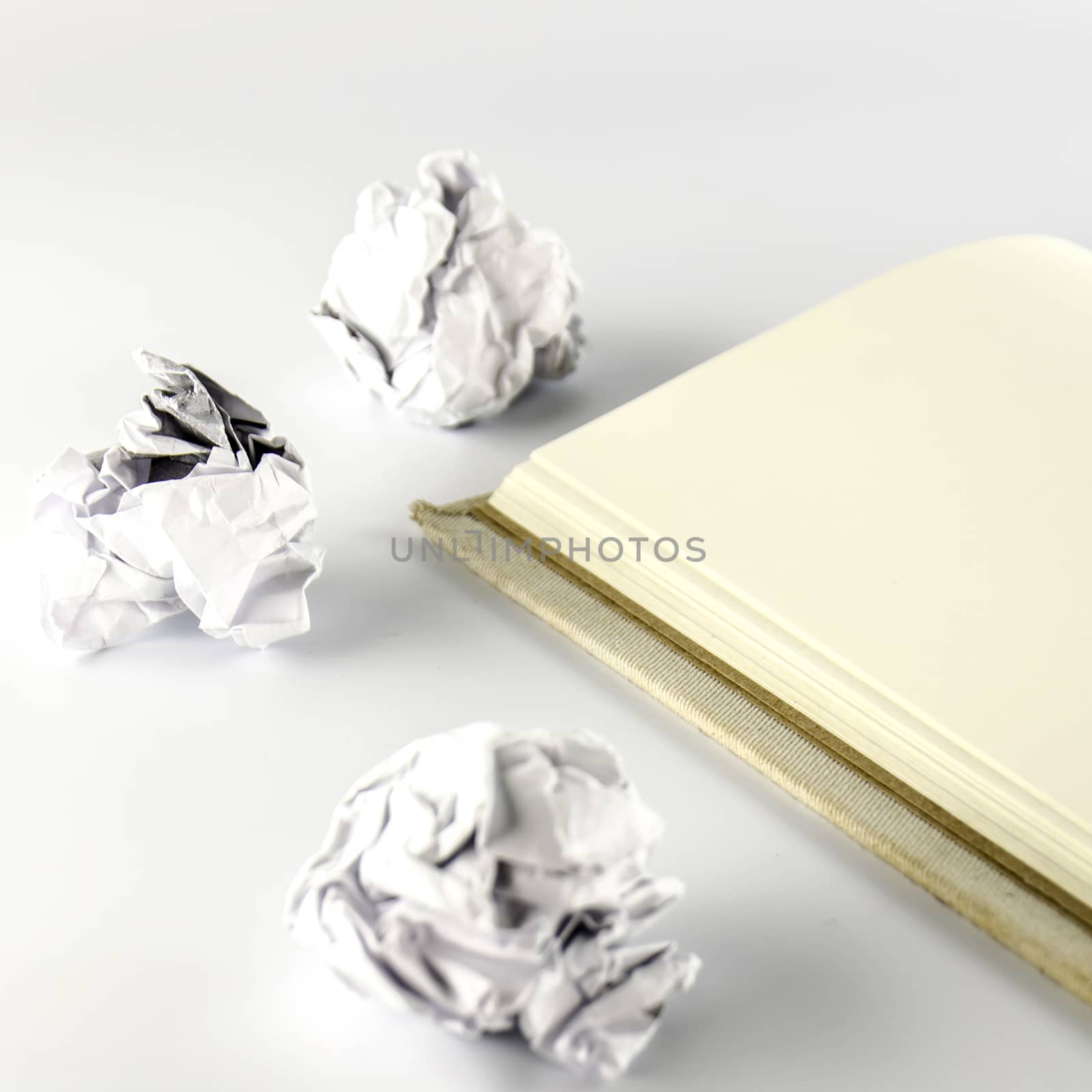 crumpled paper and notebook by ammza12