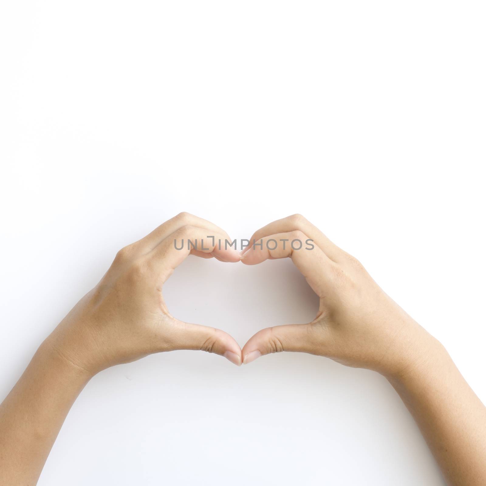 asia female hands in the form of heart on a white background