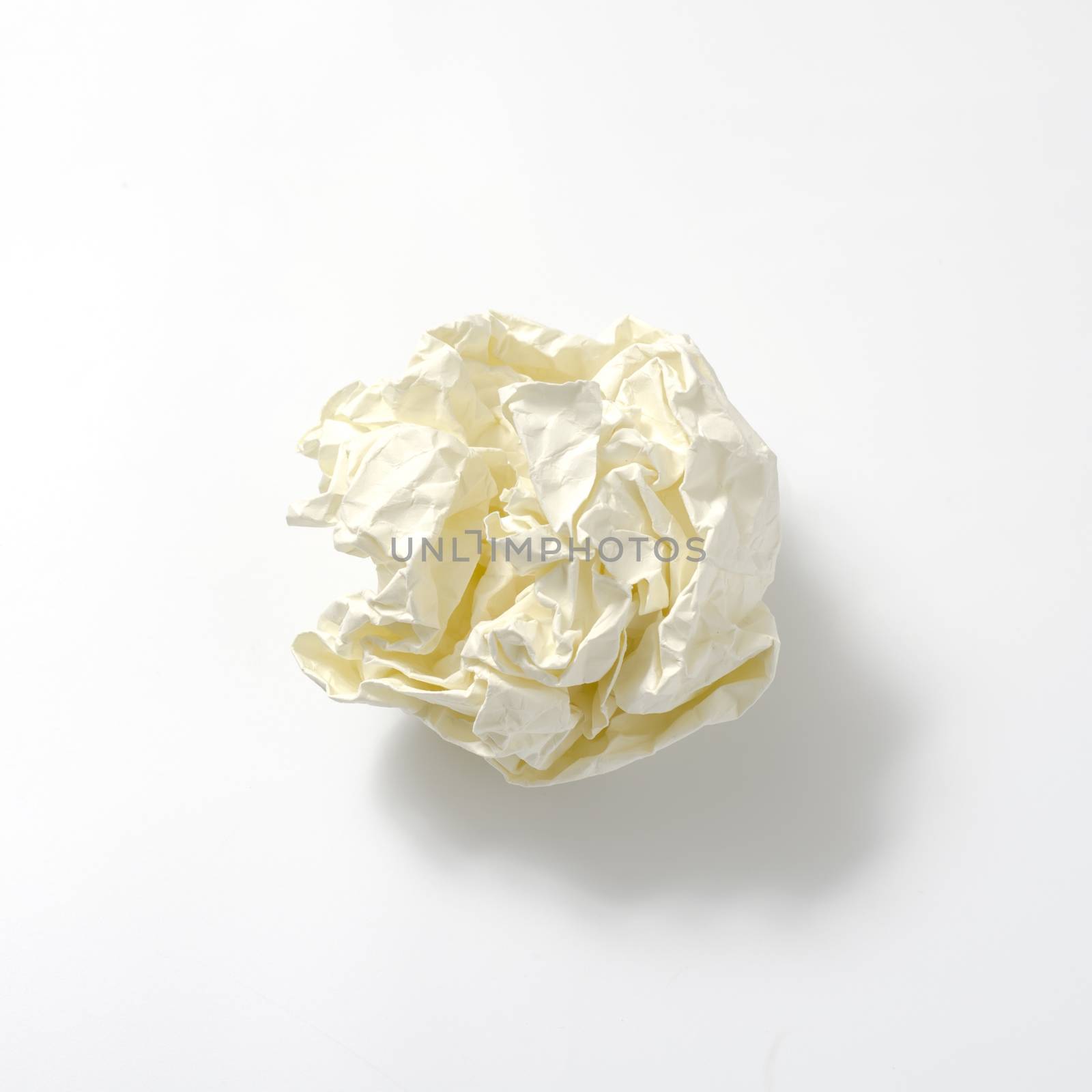 crumpled paper ball on a white background