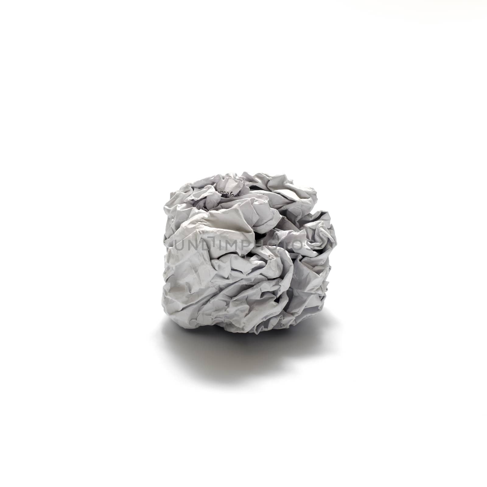white crumpled paper ball on a white background