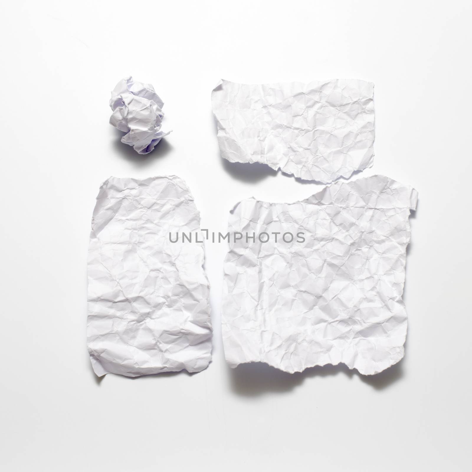 piece of white crumpled paper on a white background
