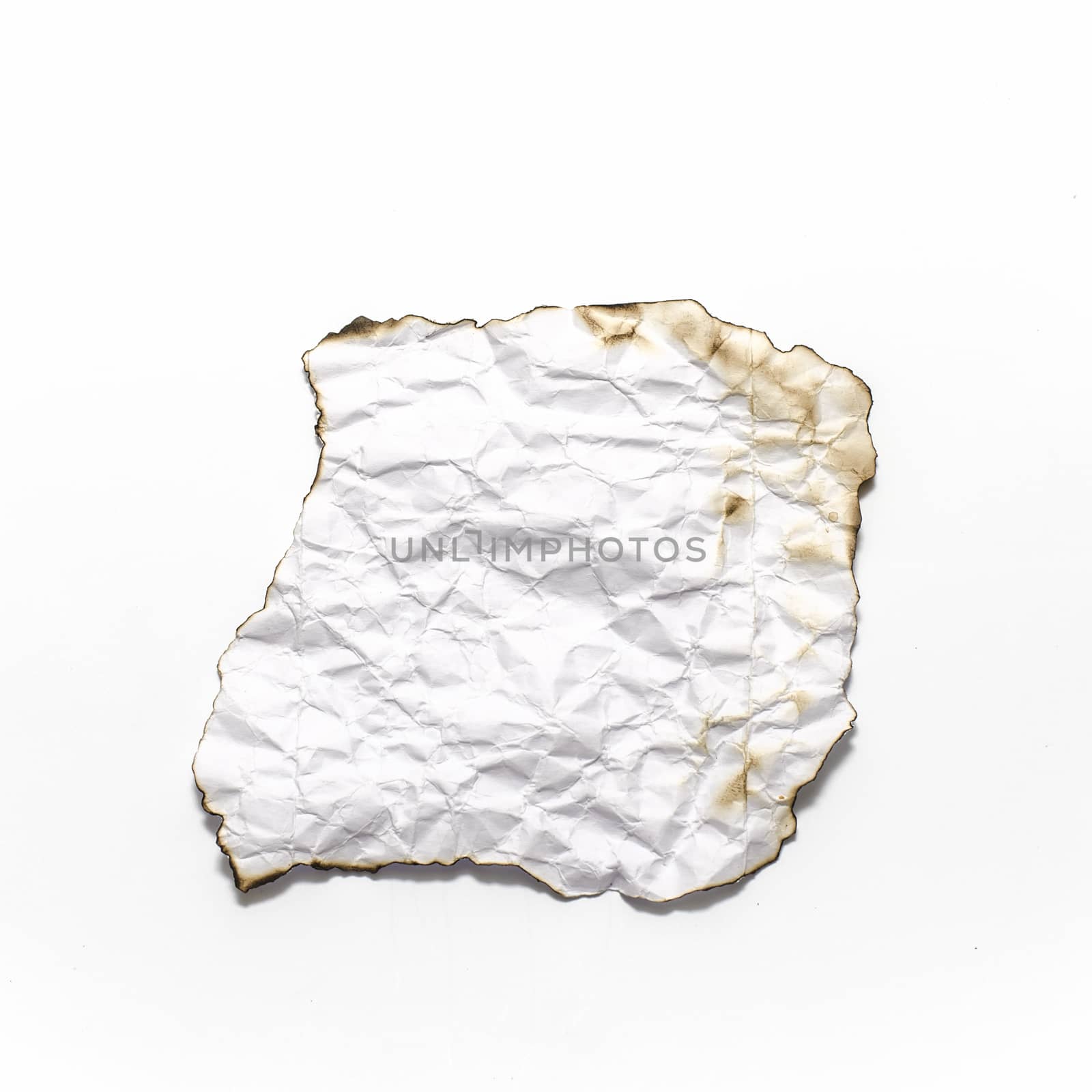 burn of crumpled paper on a white background