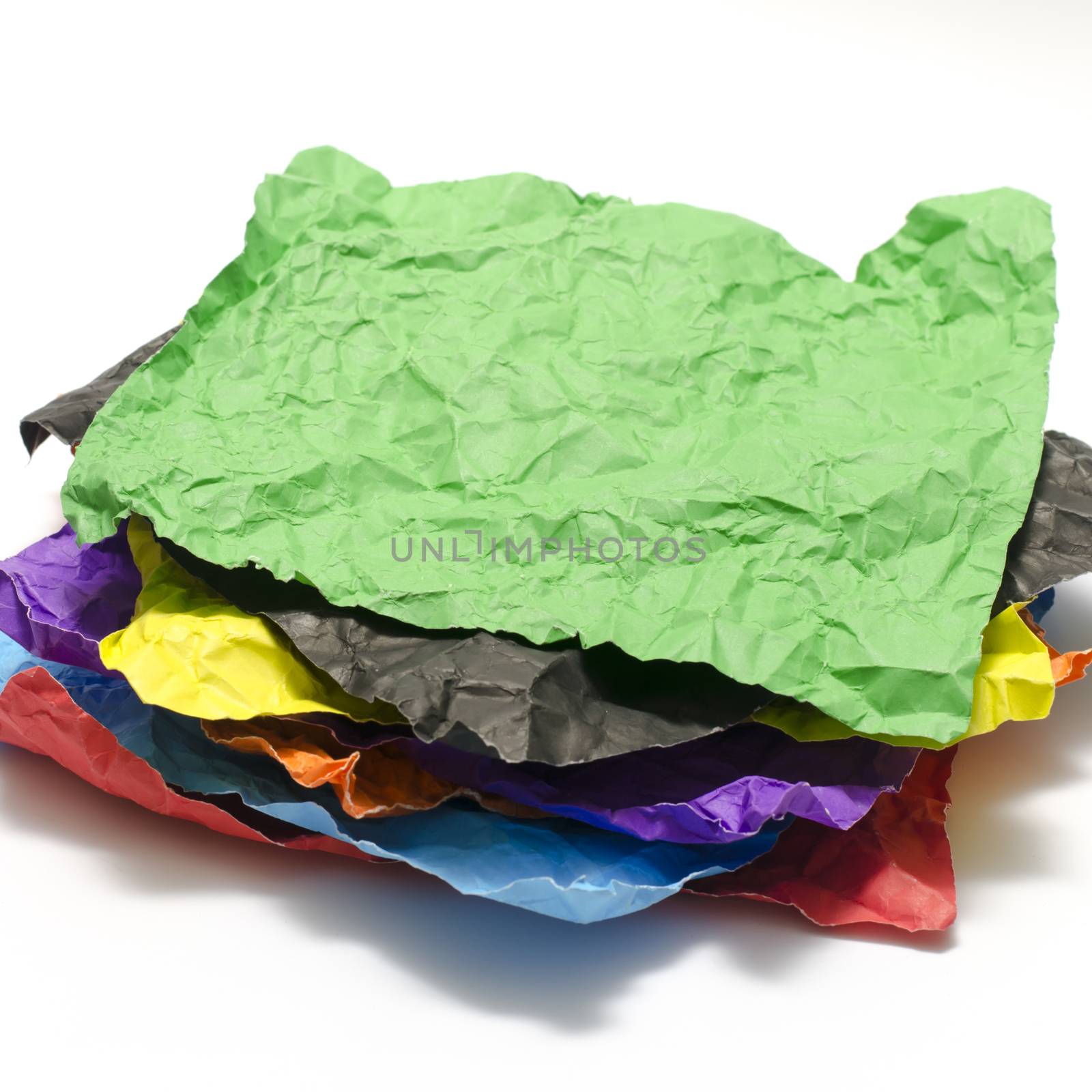 color crumpled paper on a white background