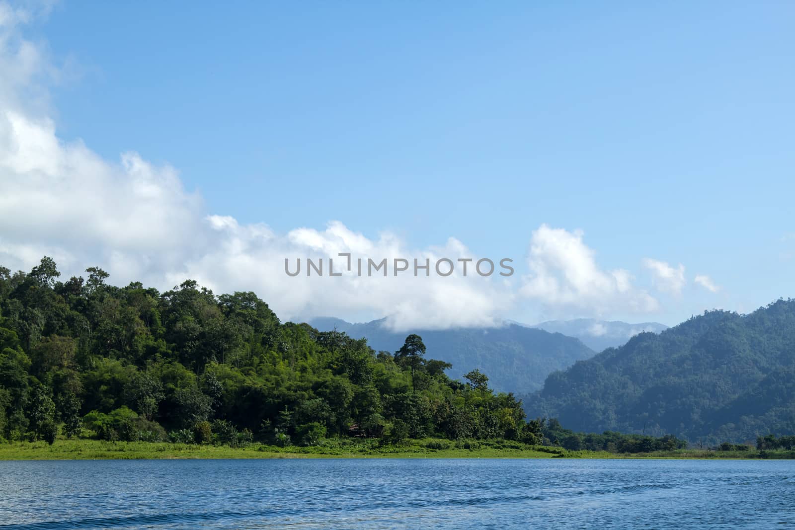 Lake mountain with clouds and blue sky