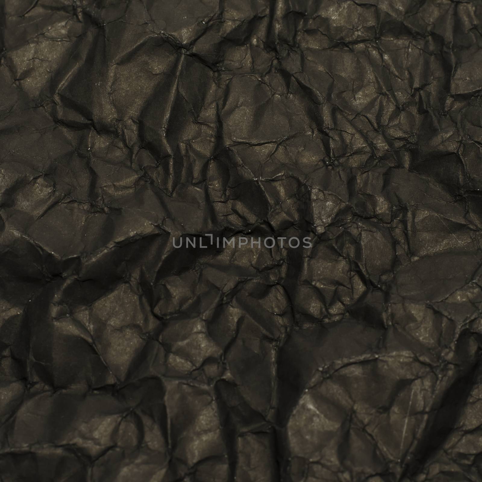 black crumpled paper texture background