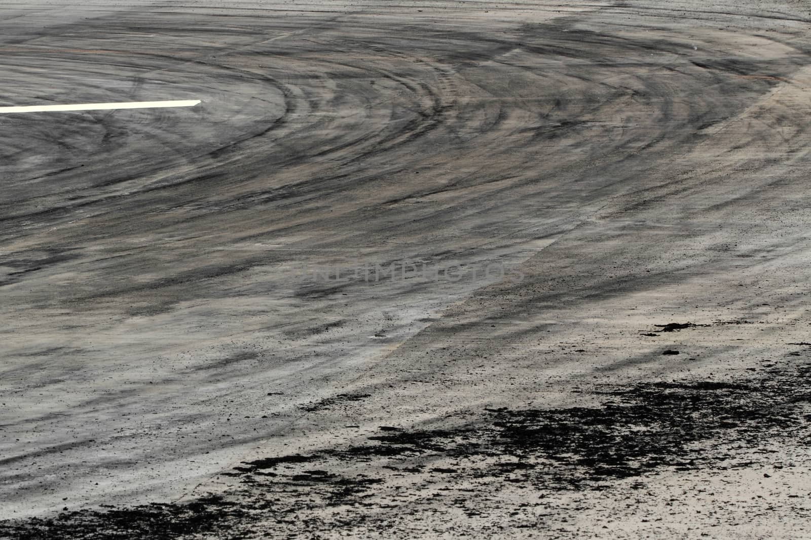 Background with tire marks on road track