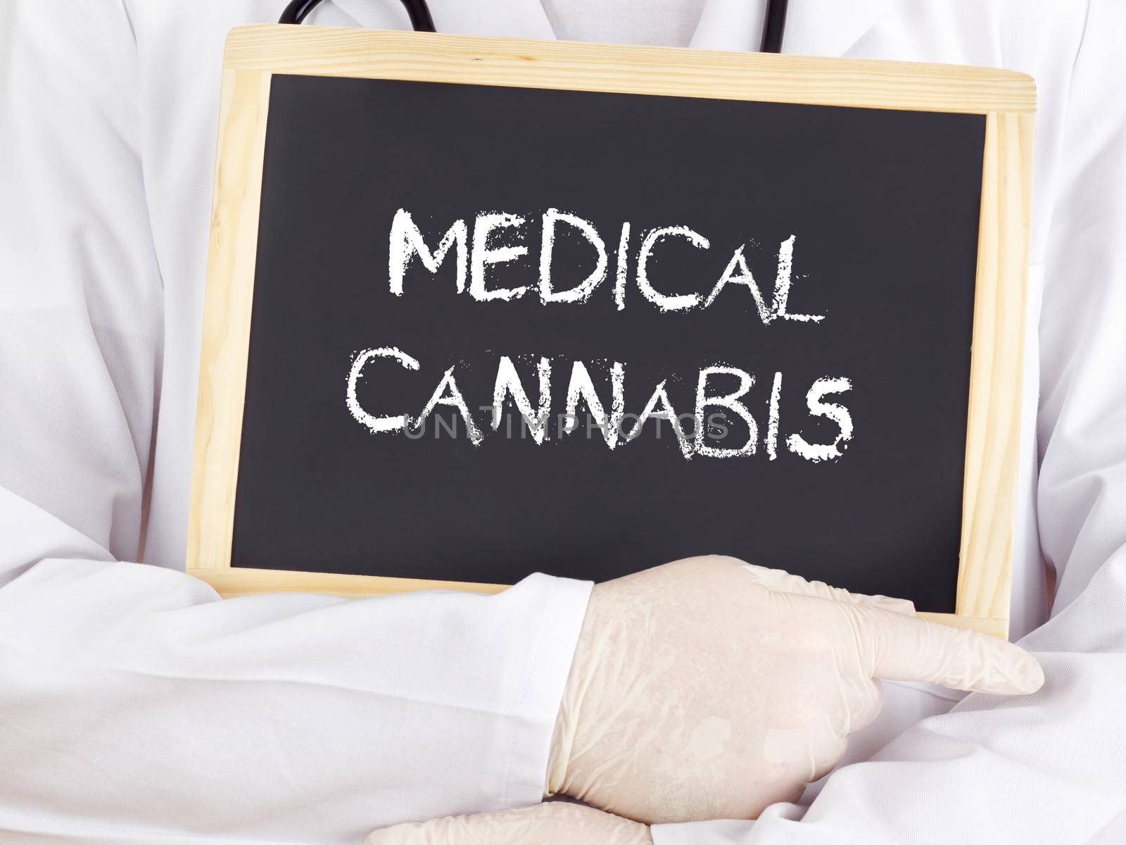 Doctor shows information on blackboard: medical cannabis
